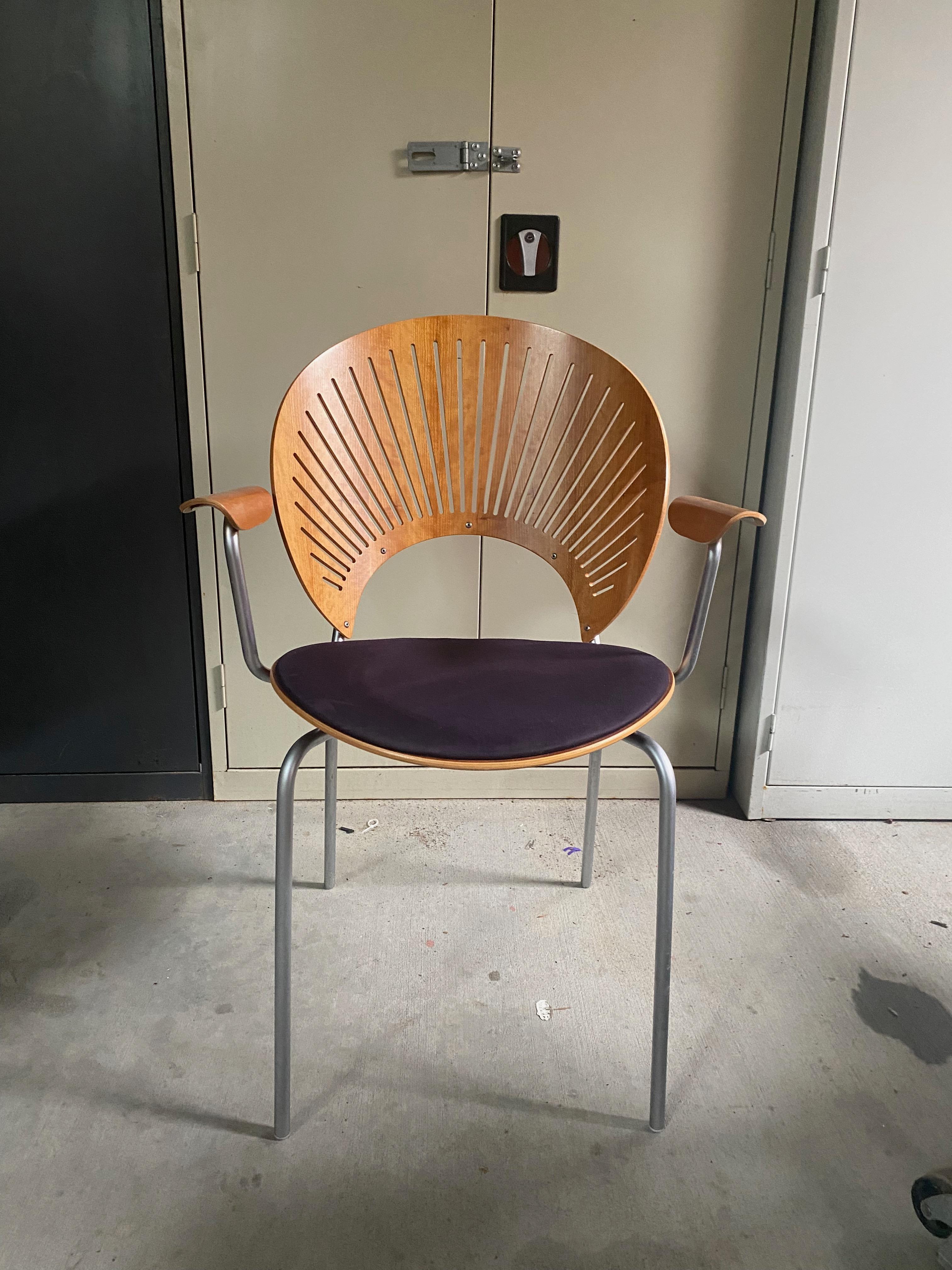 Very rare Trinidad teak dining chairs with arms by Nanna Ditzel for Fredericia Stolefabrik Denmark, circa 1995.  The seat cushions in Aubergine Ultrasuede are in good condition and are easily reupholstered in your choice of fabric or leather upon