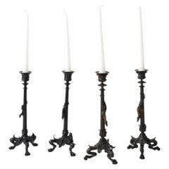 Ensemble de quatre chandeliers tripodes zoomorphes en bronze, C.I.C.