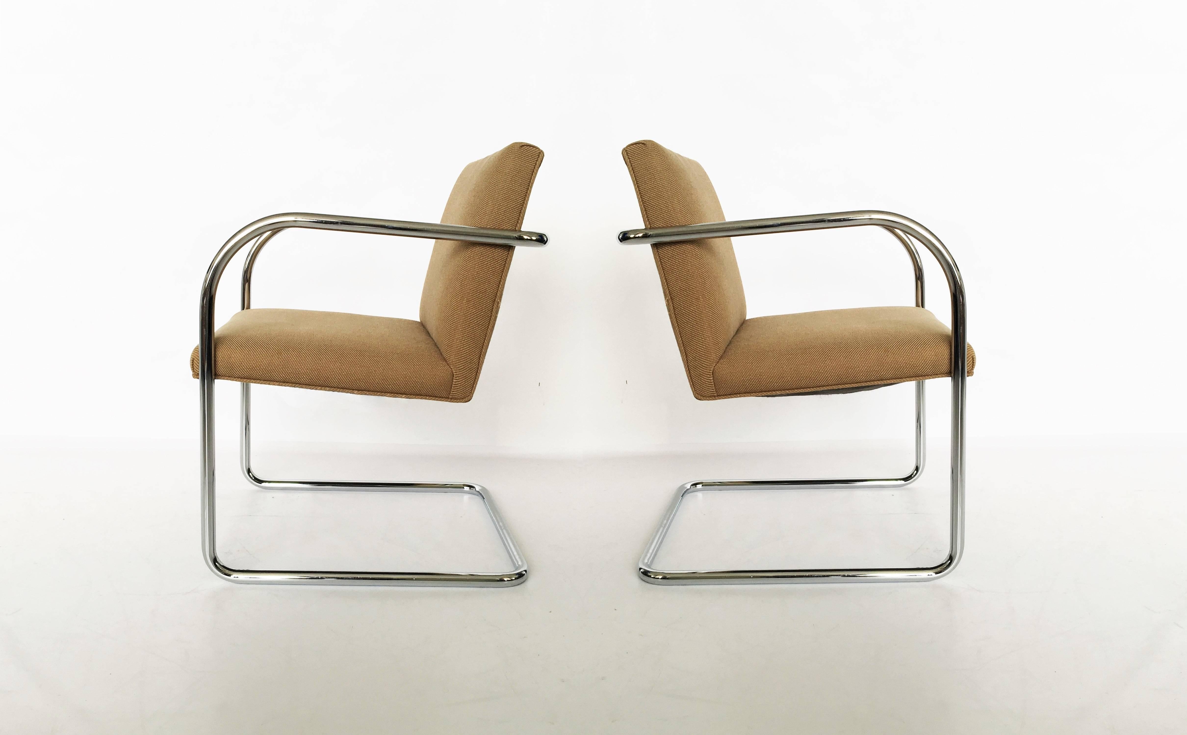 Set of four Brno chairs. The cantilevered frame is a single piece of tubular chromed steel. Seats are in their original upholstery. Original vintage condition. Upholstery is recommended. Can be reupholstered in your choice of fabric.