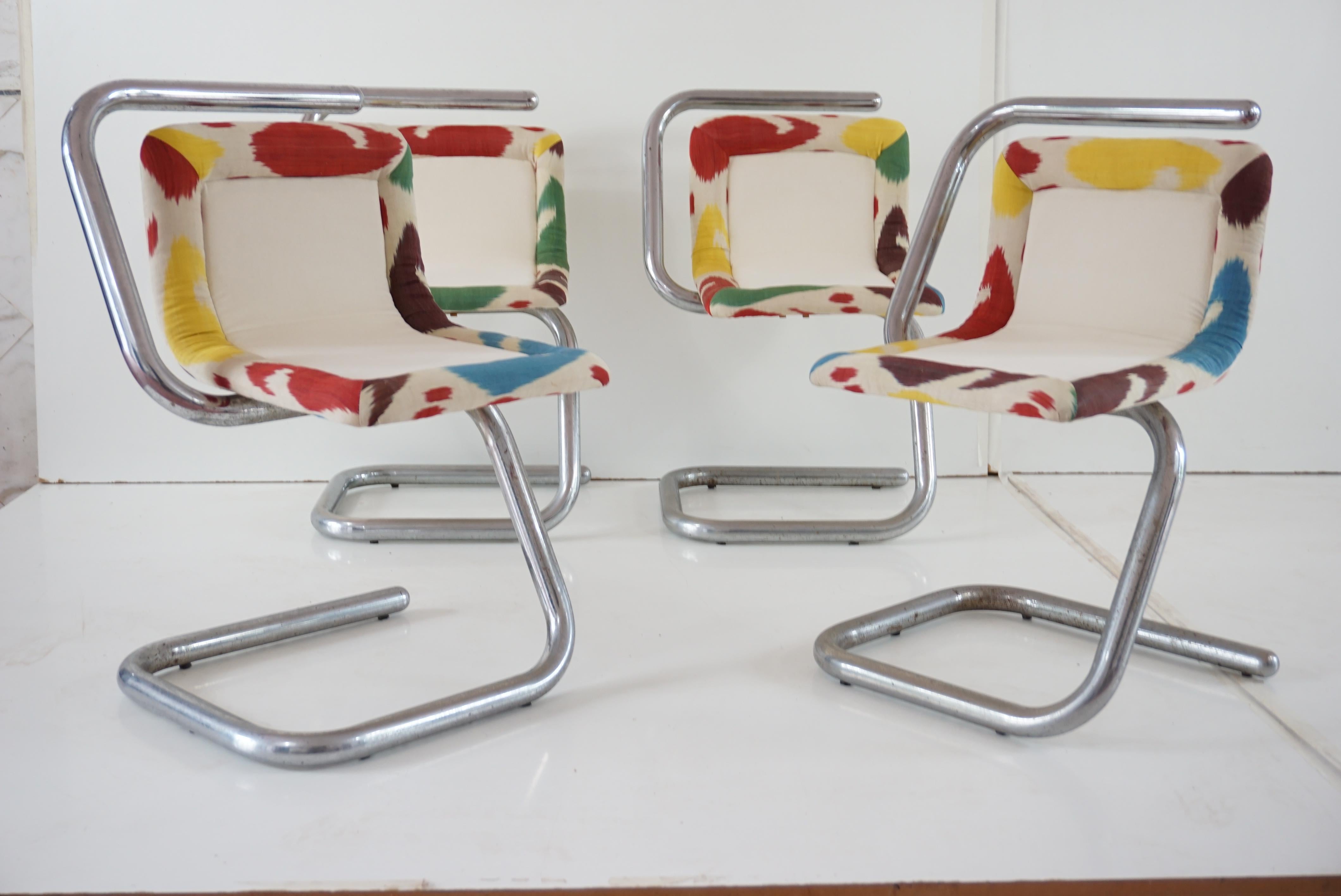 Set of four chrome tubular chairs, circa 1970
chrome, velvet and ikat silk
re-upholstered in white velvet and frame with original ikat turkish silk
Measures: height:74 cm , 49x 48 cm; height seat: 43
good condition 
some signs of rust on the