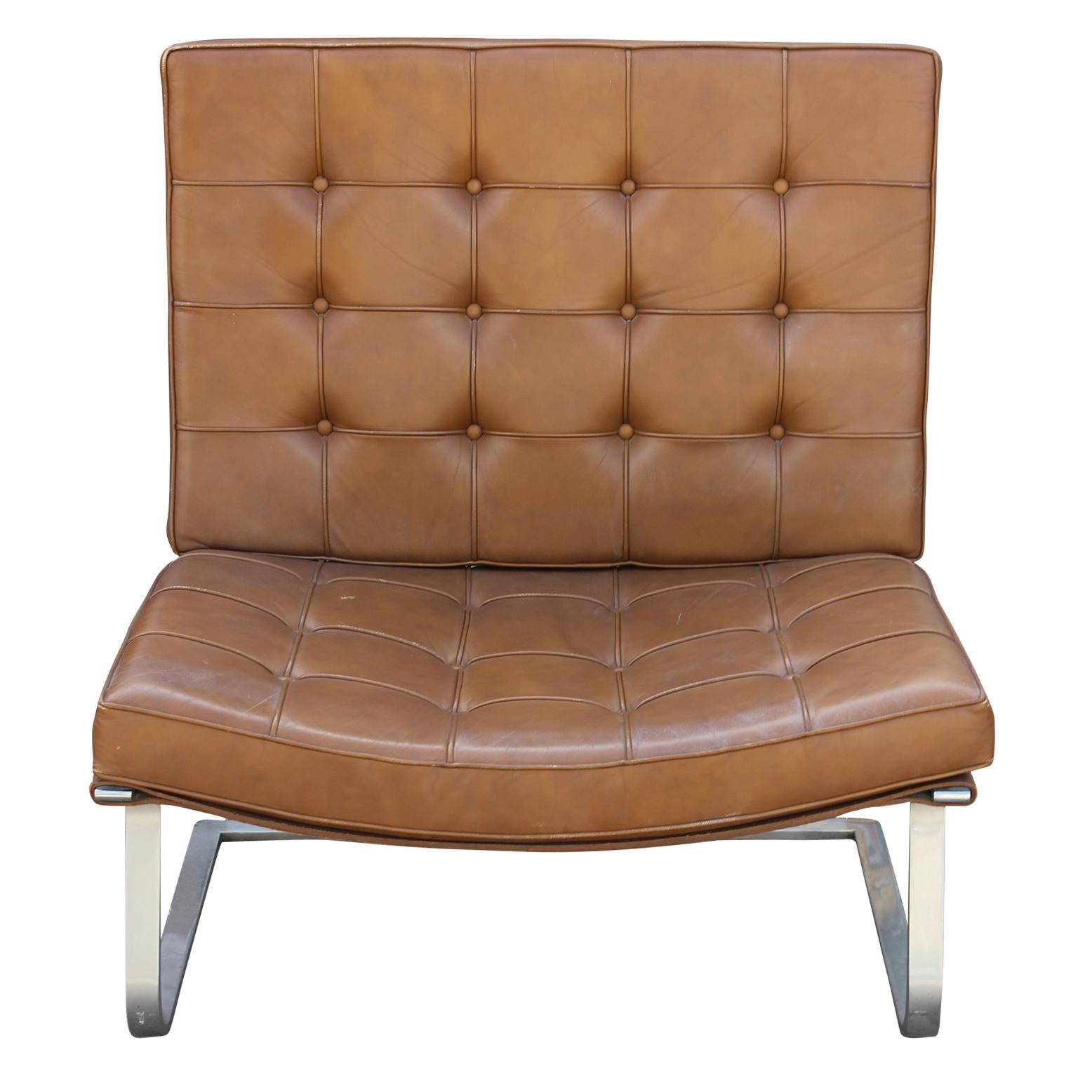 Stunning set of four, original brown leather Mies Van Der Rohe Tugendhat chairs. The material is a caramel colored brown leather. Polished stainless steel. The cantilever design provides a natural spring.