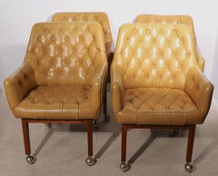 Set of Four Tufted Leather Armchairs by B.L. Marble