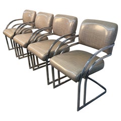 Ensemble de quatre chaises de salle à manger tapissées By Contemporary Shells Inc. Ensemble de quatre chaises de salle à manger tapissées By Contemporary Shells Inc.