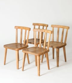 Set of Four "Utö" Pine Chairs by Axel Einar Hjorth, Nordiska Kompaniet, 1930s