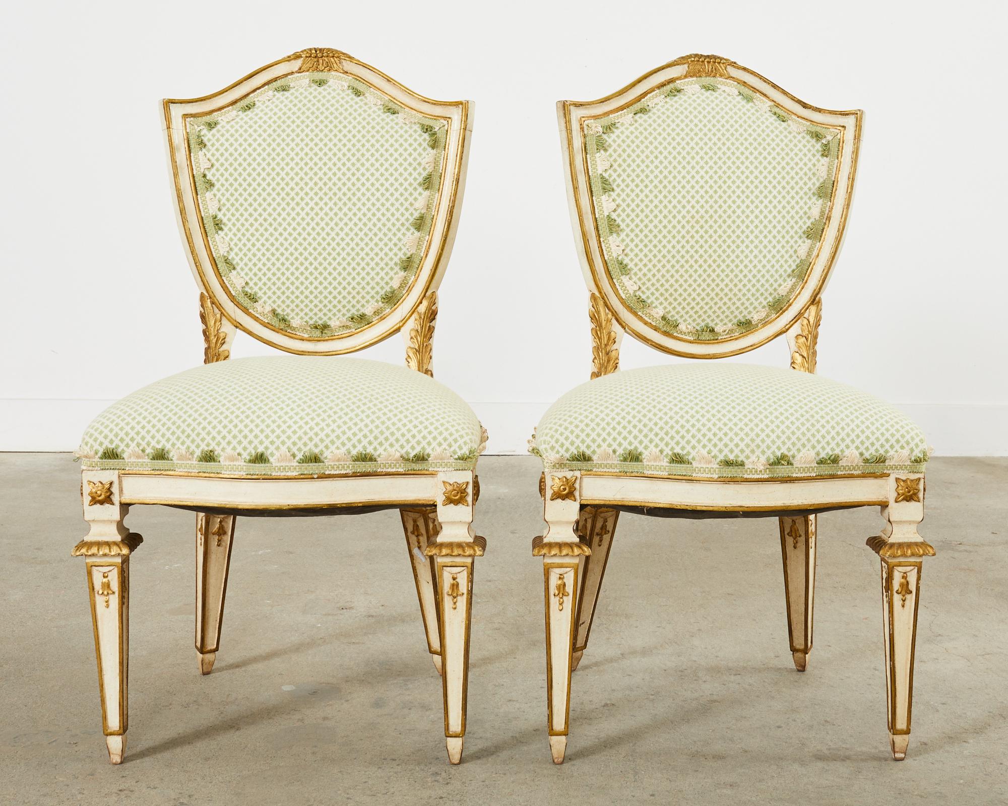 Italian Set of Four Venetian Parcel Gilt Painted Shield Back Dining Chairs For Sale