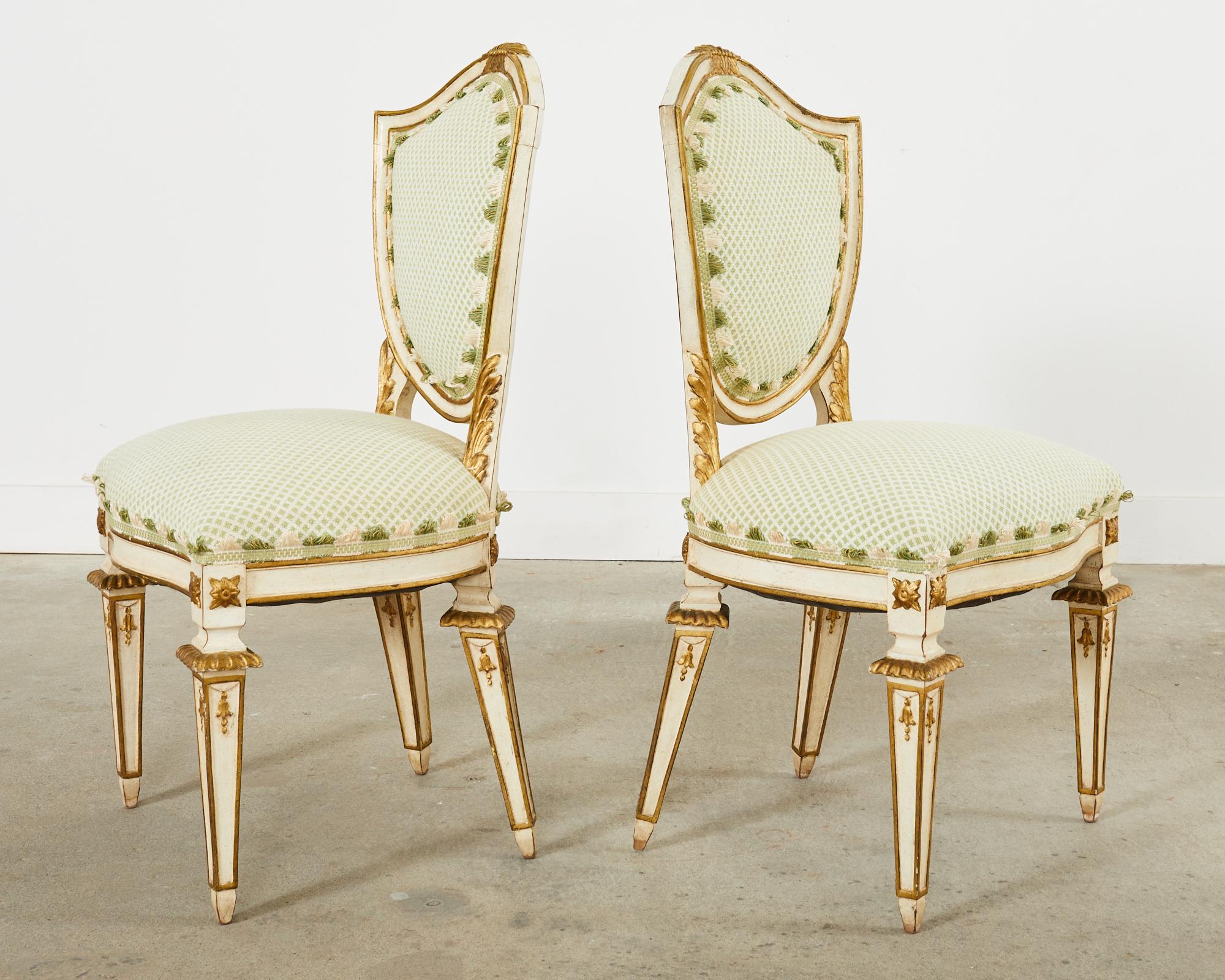 Set of Four Venetian Parcel Gilt Painted Shield Back Dining Chairs In Good Condition For Sale In Rio Vista, CA