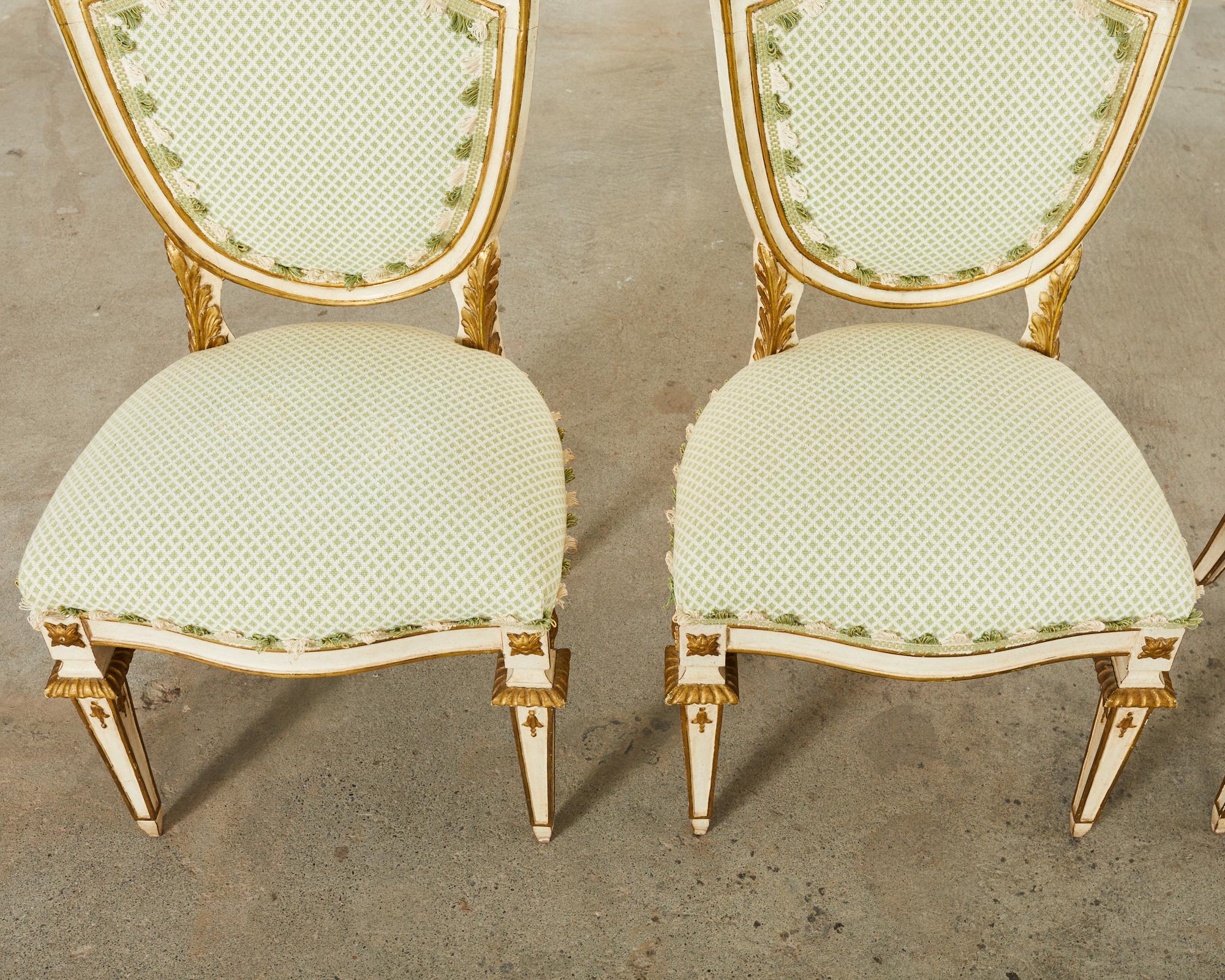 20th Century Set of Four Venetian Parcel Gilt Painted Shield Back Dining Chairs For Sale