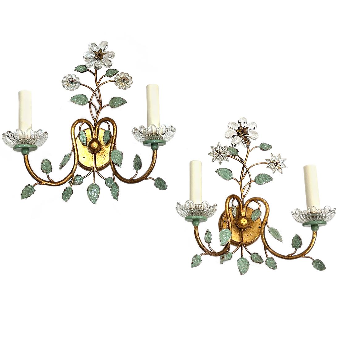 A set of four circa 1950's French gilt metal sconces with verdigris, molded glass leaves and crystal flowers. Sold in pairs.

Measurements:
Height: 14