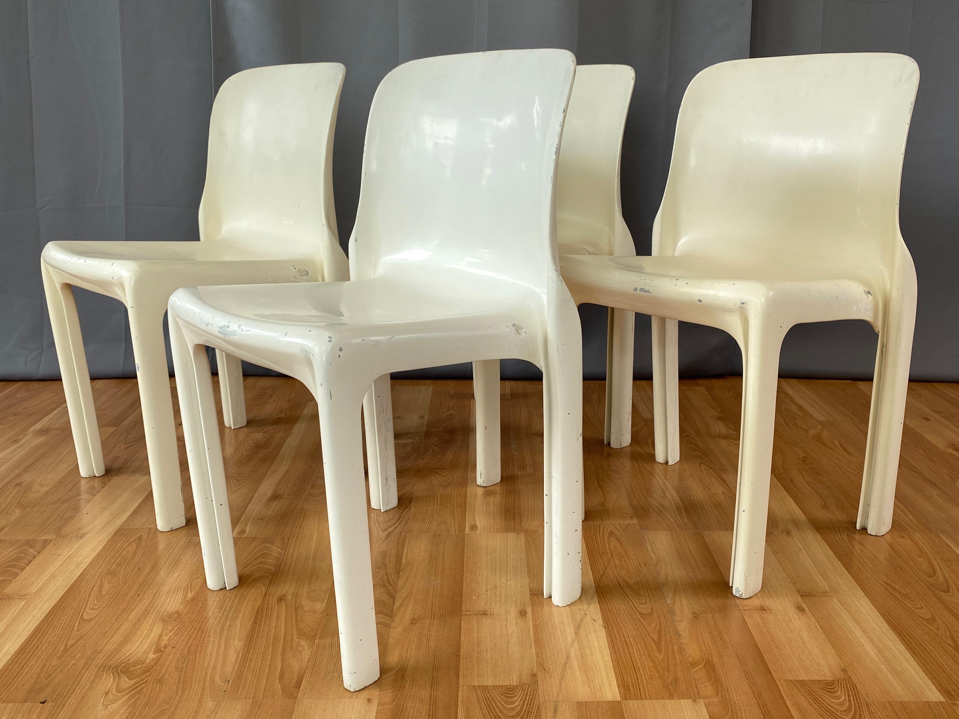 A 1968 four-piece set of white Selene stackable dining or side chairs by Vico Magistretti for Artemide Milano.

A direct offshoot of the 1966 Studio table line, and an immediate predecessor of the Gaudi and Vicario armchairs, the Selene chair is in