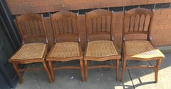 Set of Four Victorian Walnut and Cane Seat Side Chairs