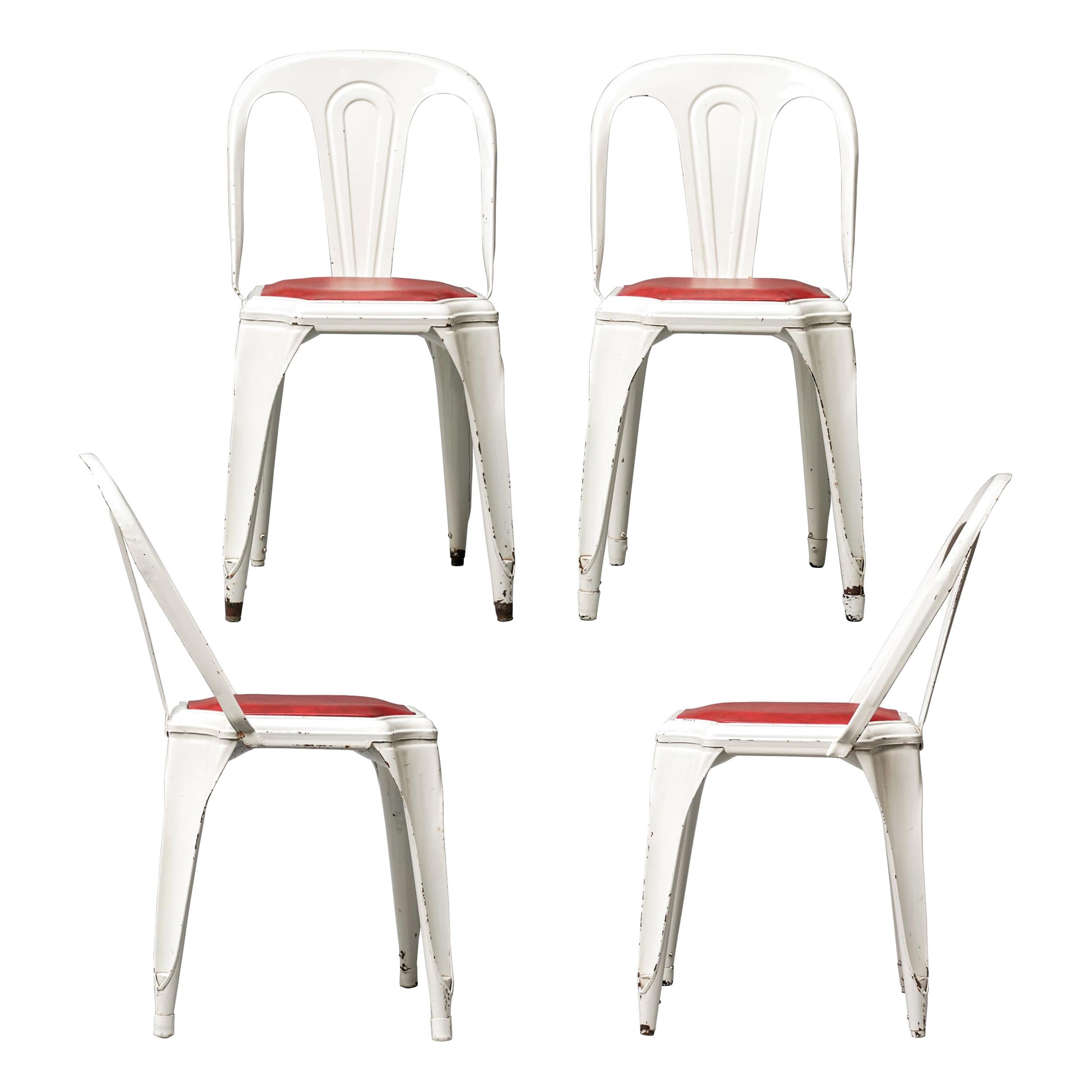 Ensemble de quatre chaises de terrasse empilables en fibre de verre industrielle belge des années 1950