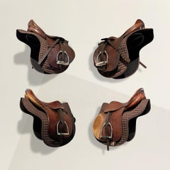 Set of Four Vintage American Jump Saddles on Racks
