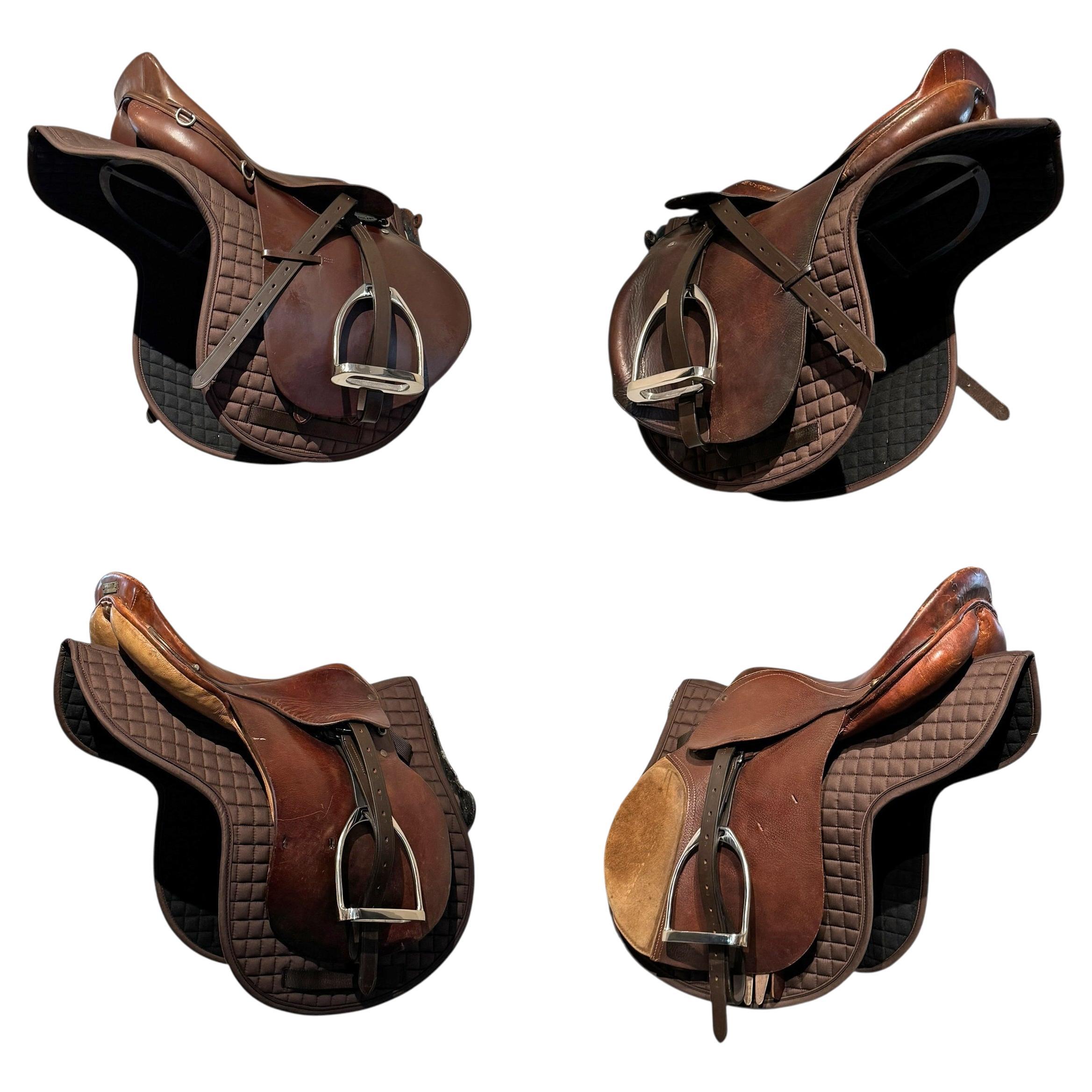 Set of Four Vintage American Jump Saddles on Racks