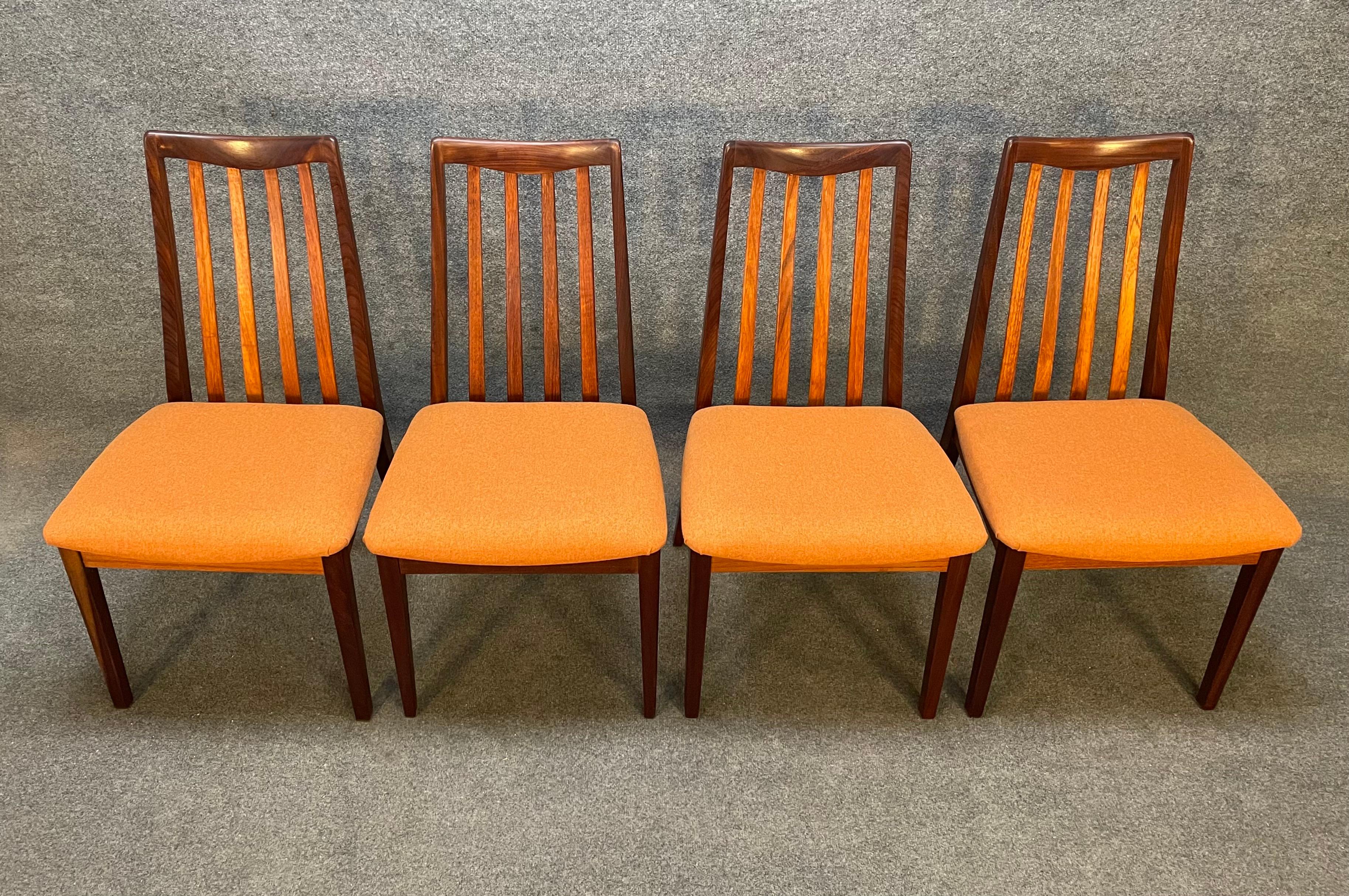 Here is a set of four beautiful British Mid-Century Modern teak dining chairs manufactured by G Plan in the 1960's.
These comfortable high back chairs, recently imported from England to California before their refinishing, feature a vibrant wood