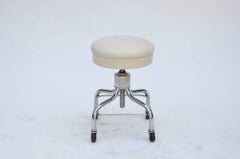 Set of Four Vintage Chrome and White Leather Adjustable Rolling Stools