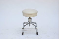 Set of Four Vintage Chrome and White Leather Adjustable Rolling Stools