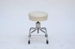 Set of Four Vintage Chrome and White Leather Adjustable Rolling Stools