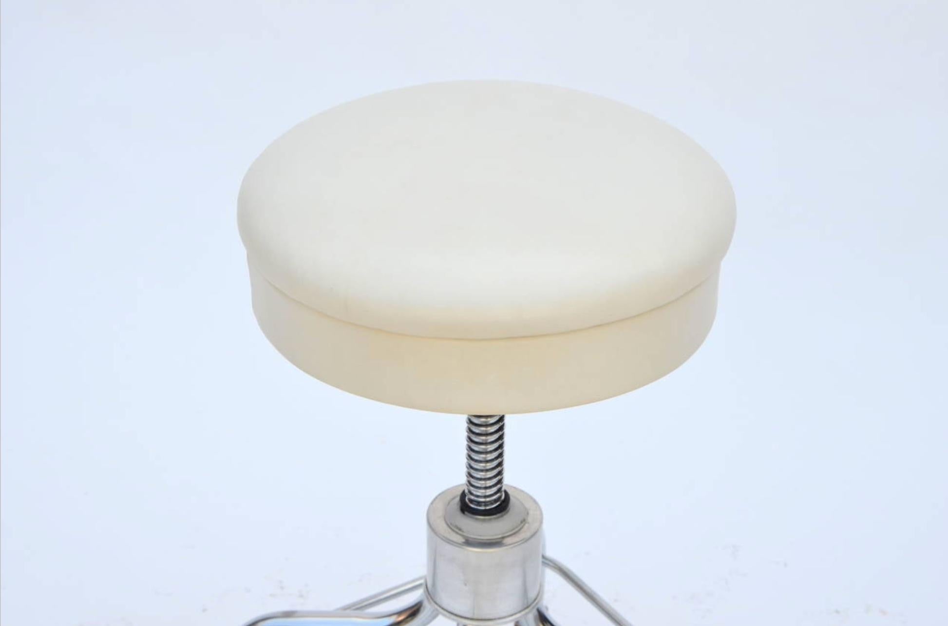 Industrial Set of Four Vintage Chrome and White Leather Adjustable Rolling Stools For Sale