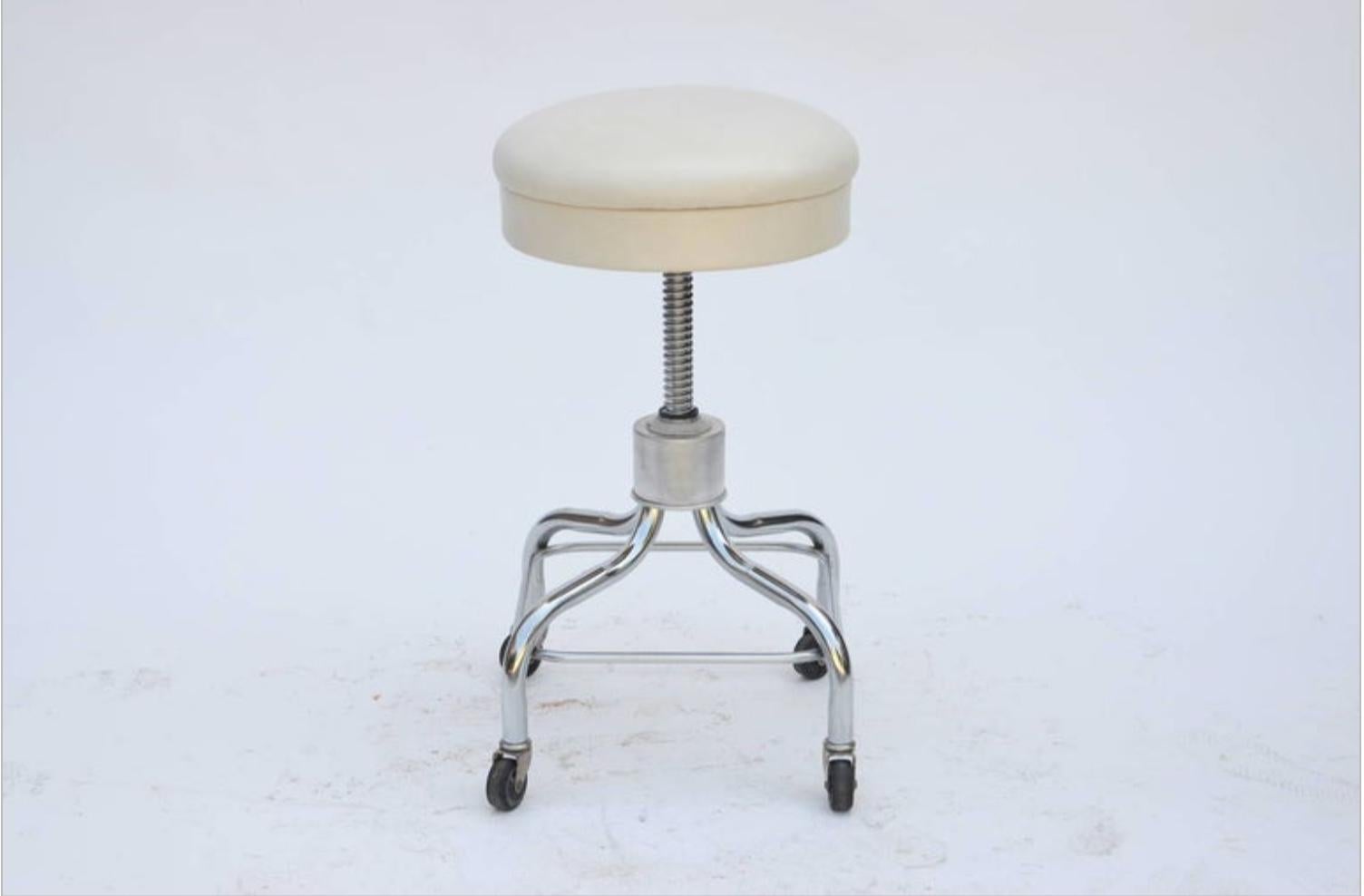 American Set of Four Vintage Chrome and White Leather Adjustable Rolling Stools For Sale