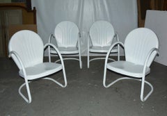 Set of Four Vintage Clam Shell Metal Spring Armchairs