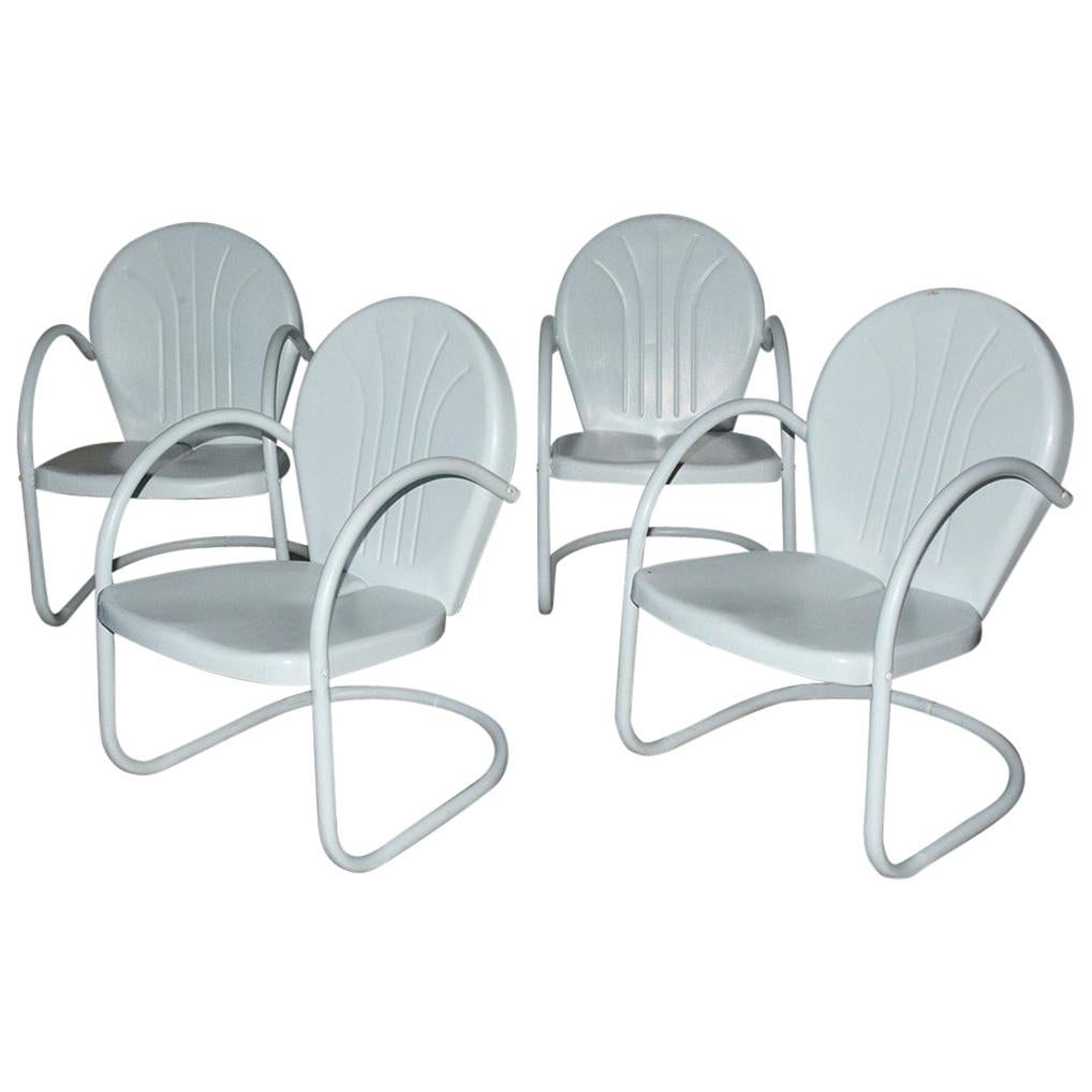 Set of Four Vintage Clam Shell Metal Spring Armchairs