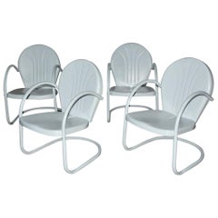 Set of Four Retro Clam Shell Metal Spring Armchairs