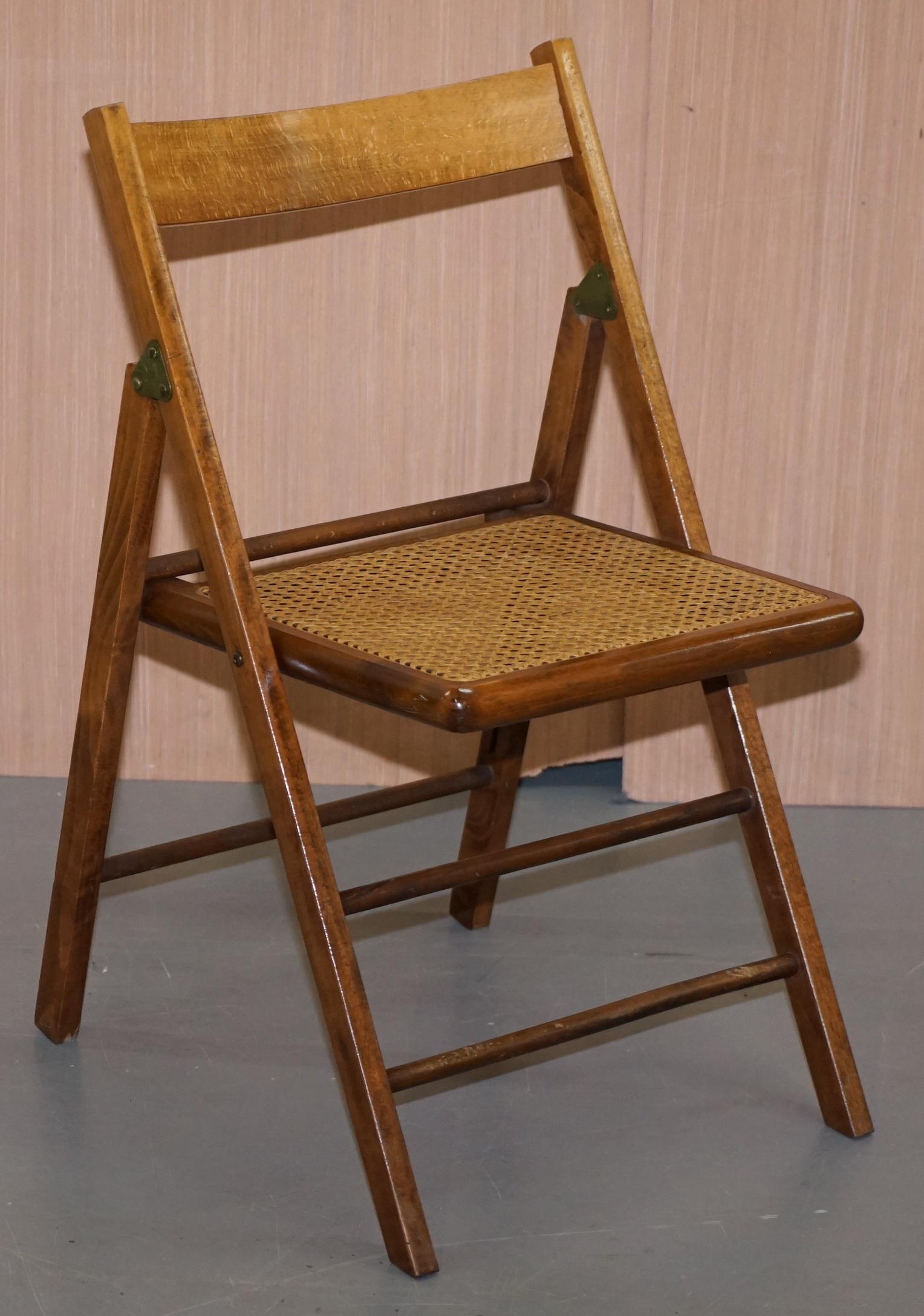 We are delighted to offer for sale this stunning set of four vintage Military campaign folding chairs in oak with brass fittings

A very utilitarian set of chairs, they fold down to be very small as below, these can stored with ease inside most