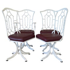 Set di quattro sedie girevoli da pranzo in stile vintage con finitura effetto bambù, colore bianco lucido