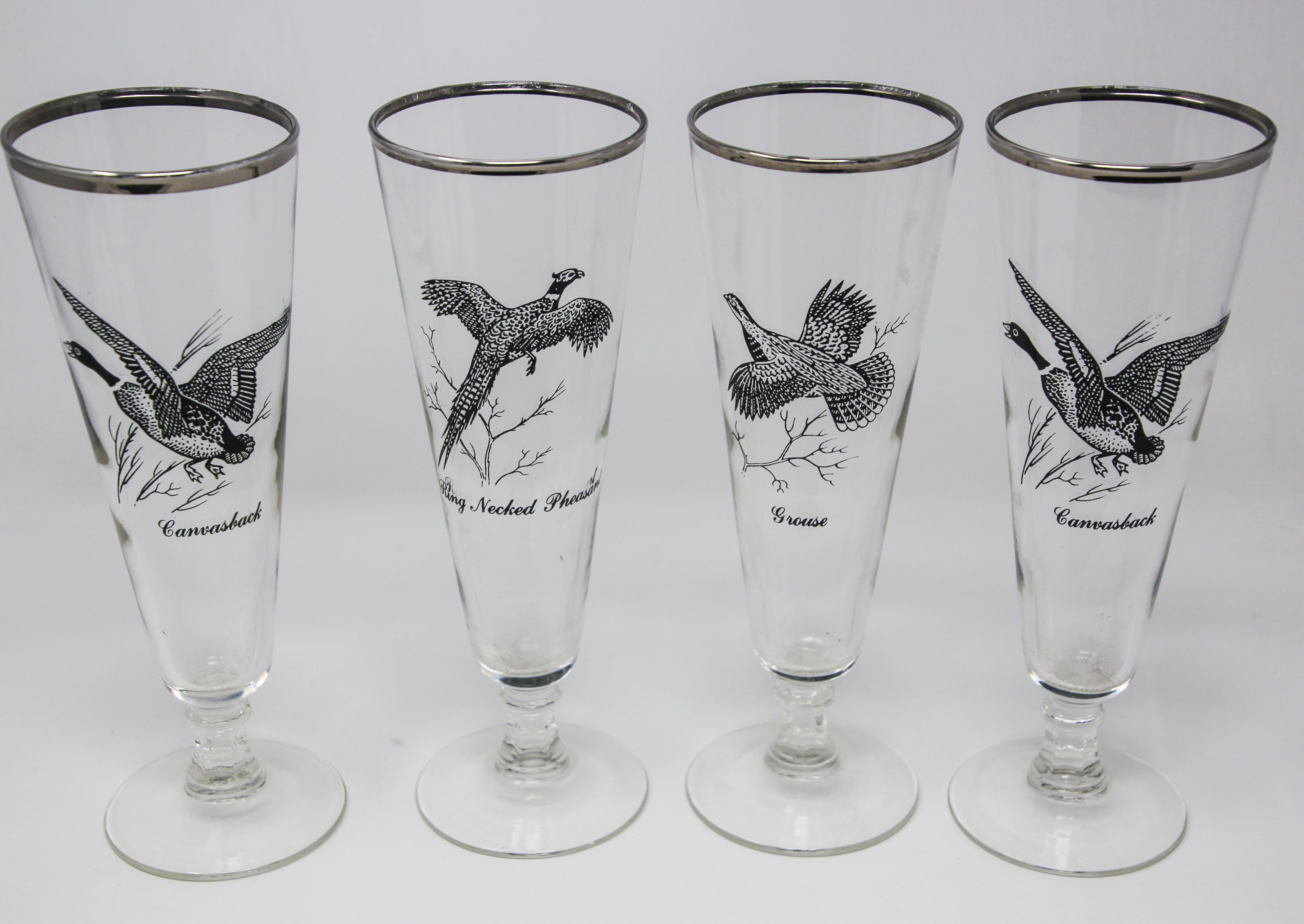 Vintage set of 4 silver rimmed federal glass pilsner glasses game bird.
Classic style for the outdoor enthusiast, tall pilsner beer glasses set in the 