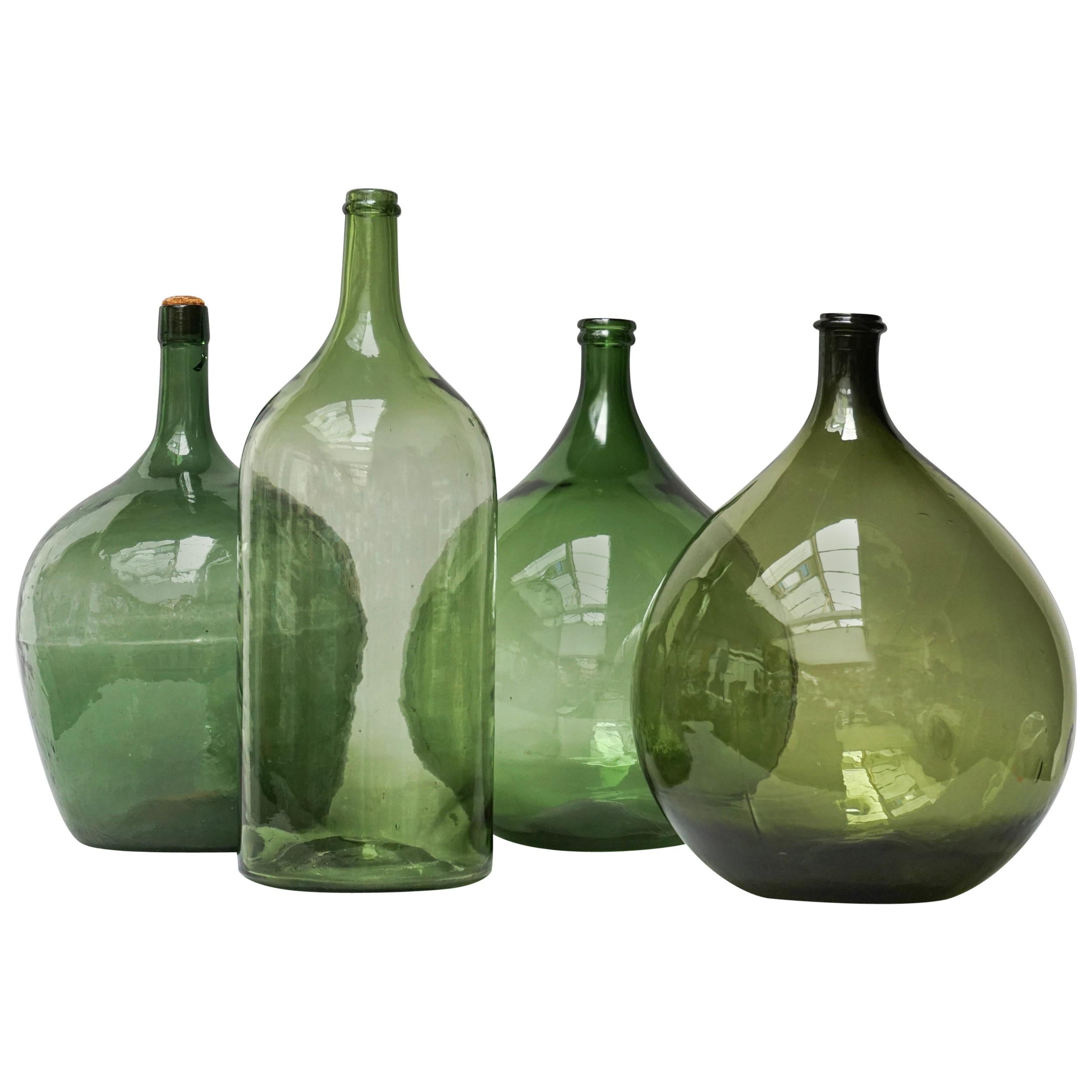 Set of Four Vintage Green Glass Bottles Demijohns, Lady Jeanne or Carboys