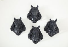 Set of Four Vintage Hermès Cast Iron Horse Heads