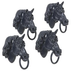 Set of Four Vintage Hermès Cast Iron Horse Heads