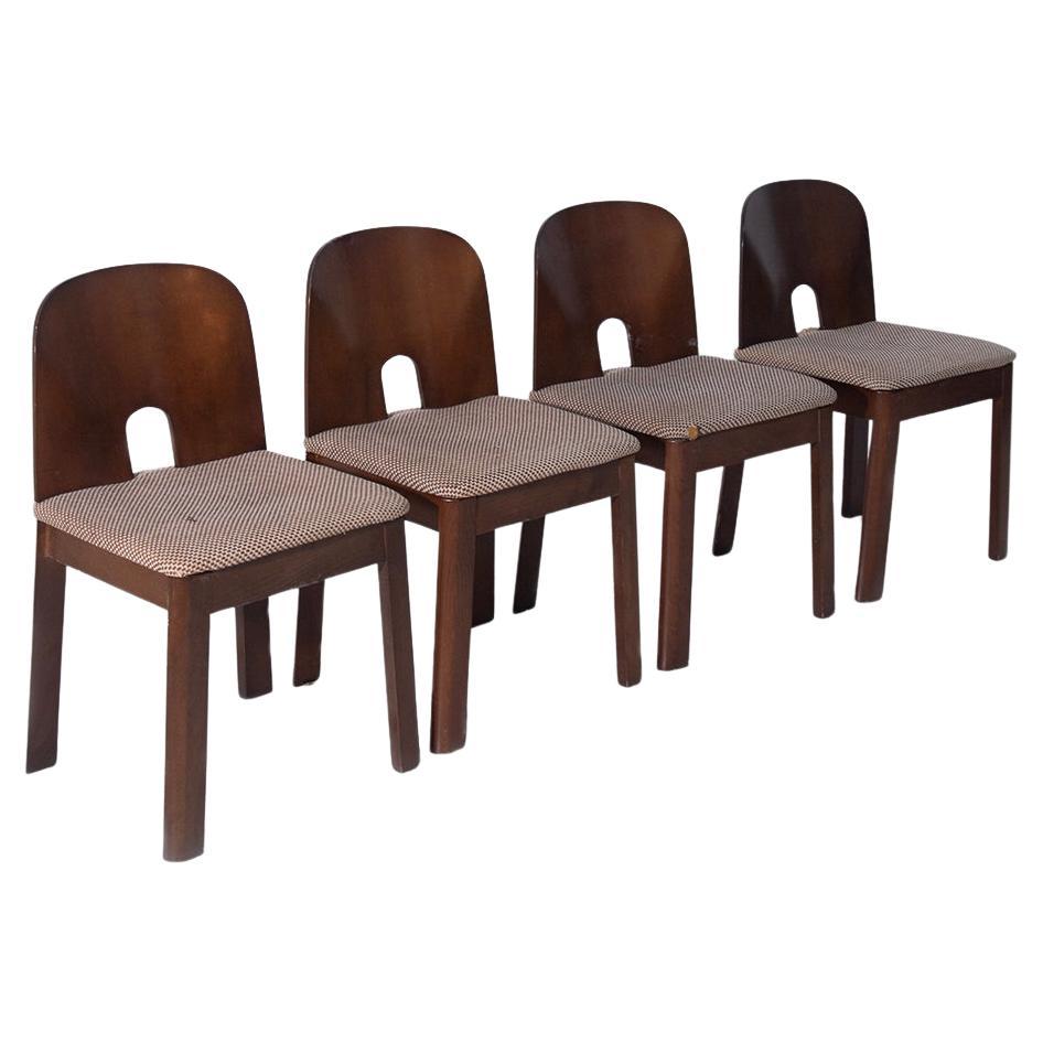 Set of four vintage Italian sculptural and iconic chairs For Sale