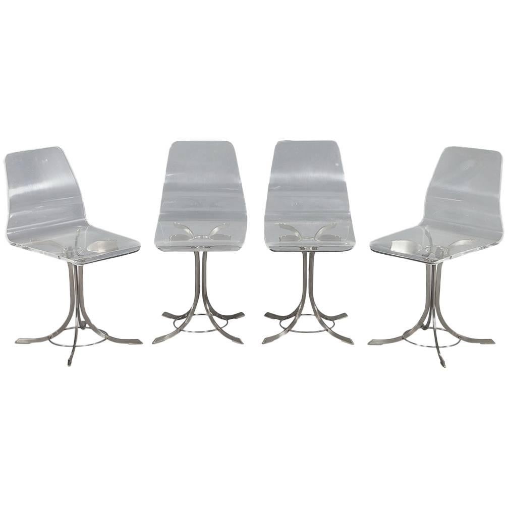 Set of Four Vintage Lucite and Stainless Steel Chairs