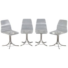 Set of Four Vintage Lucite and Stainless Steel Chairs