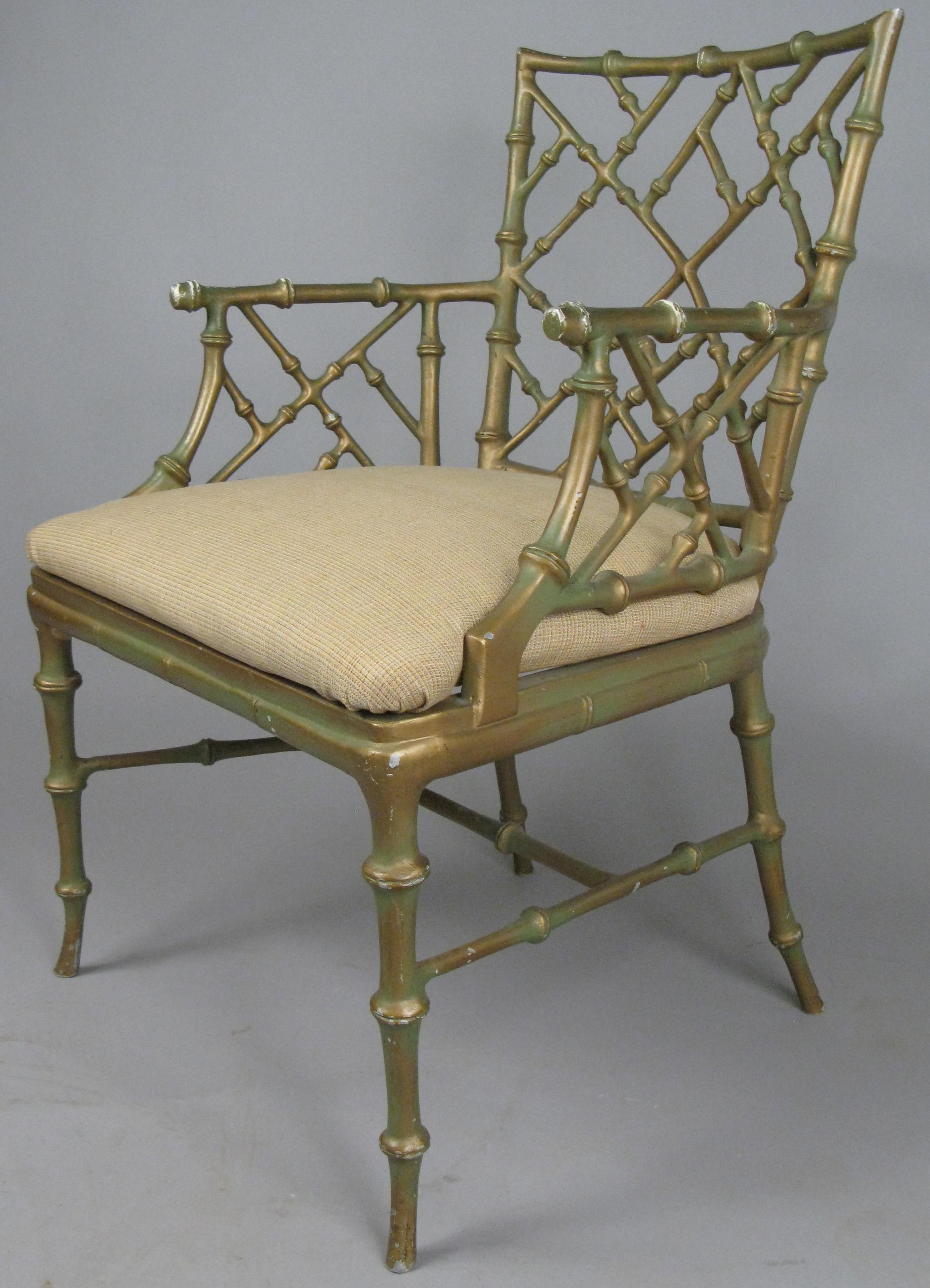 A very nice matched set of four cast metal 'bamboo' armchairs designed by Phyllis Morris. Beautiful Classic design in these very well made armchairs with wonderful details. Original gold wash finish is worn as shown.