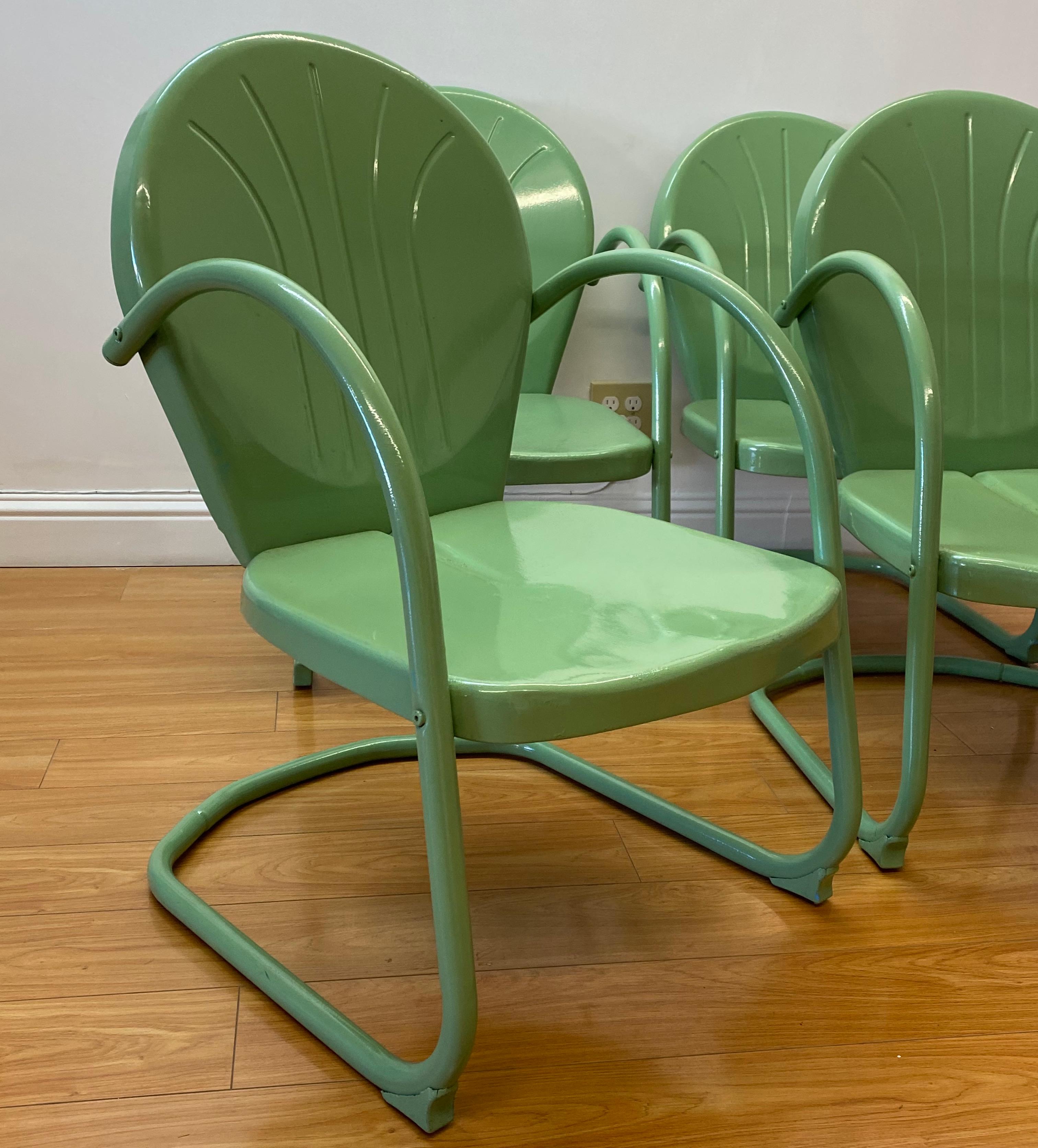 Set of Four vintage mint green enameled metal patio garden chairs, C.1940s

Restored old school metal patio chairs

These classic chairs have been restored and updated with a lovely mint green enamel covering

The chairs show some past