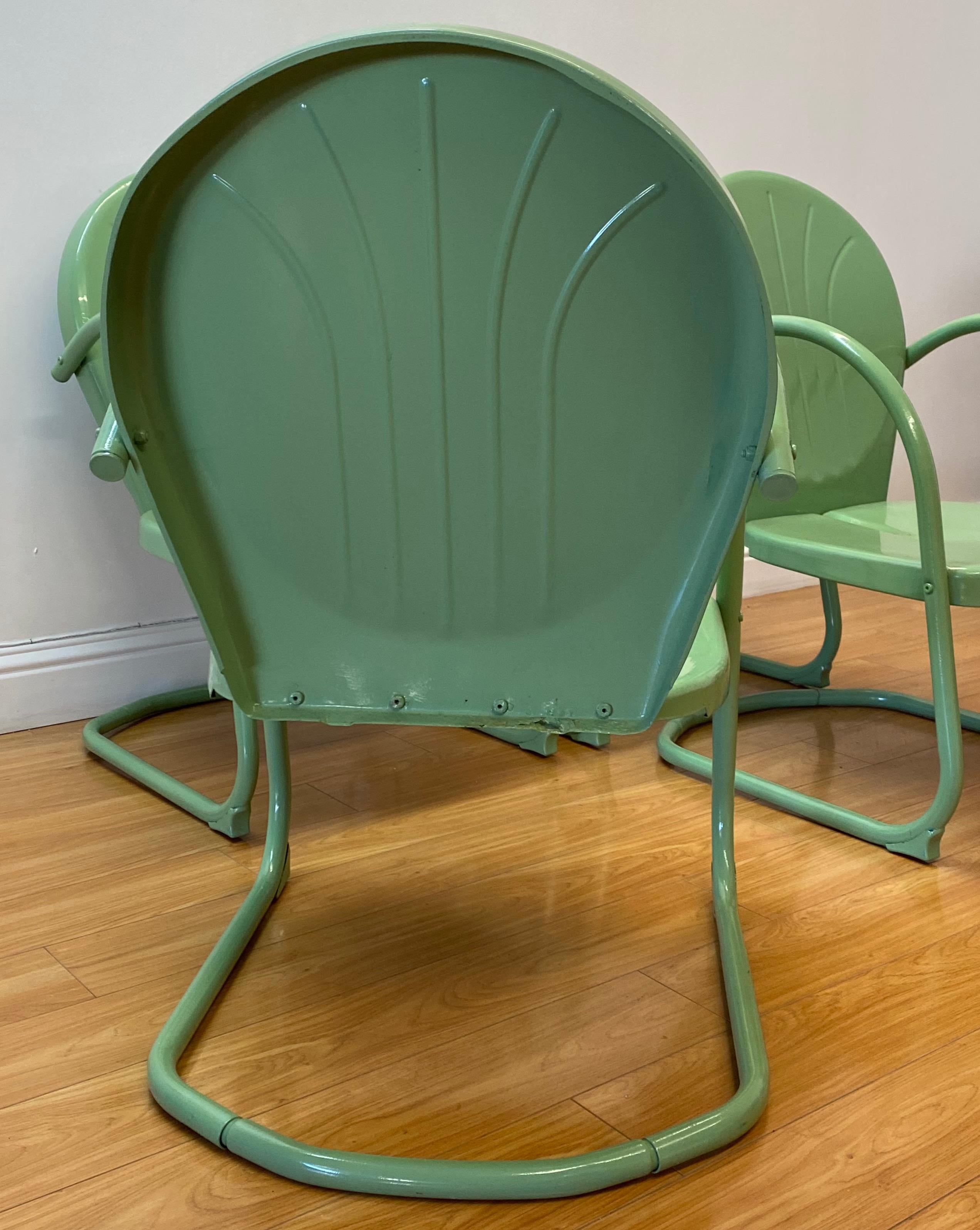 mint green metal chairs