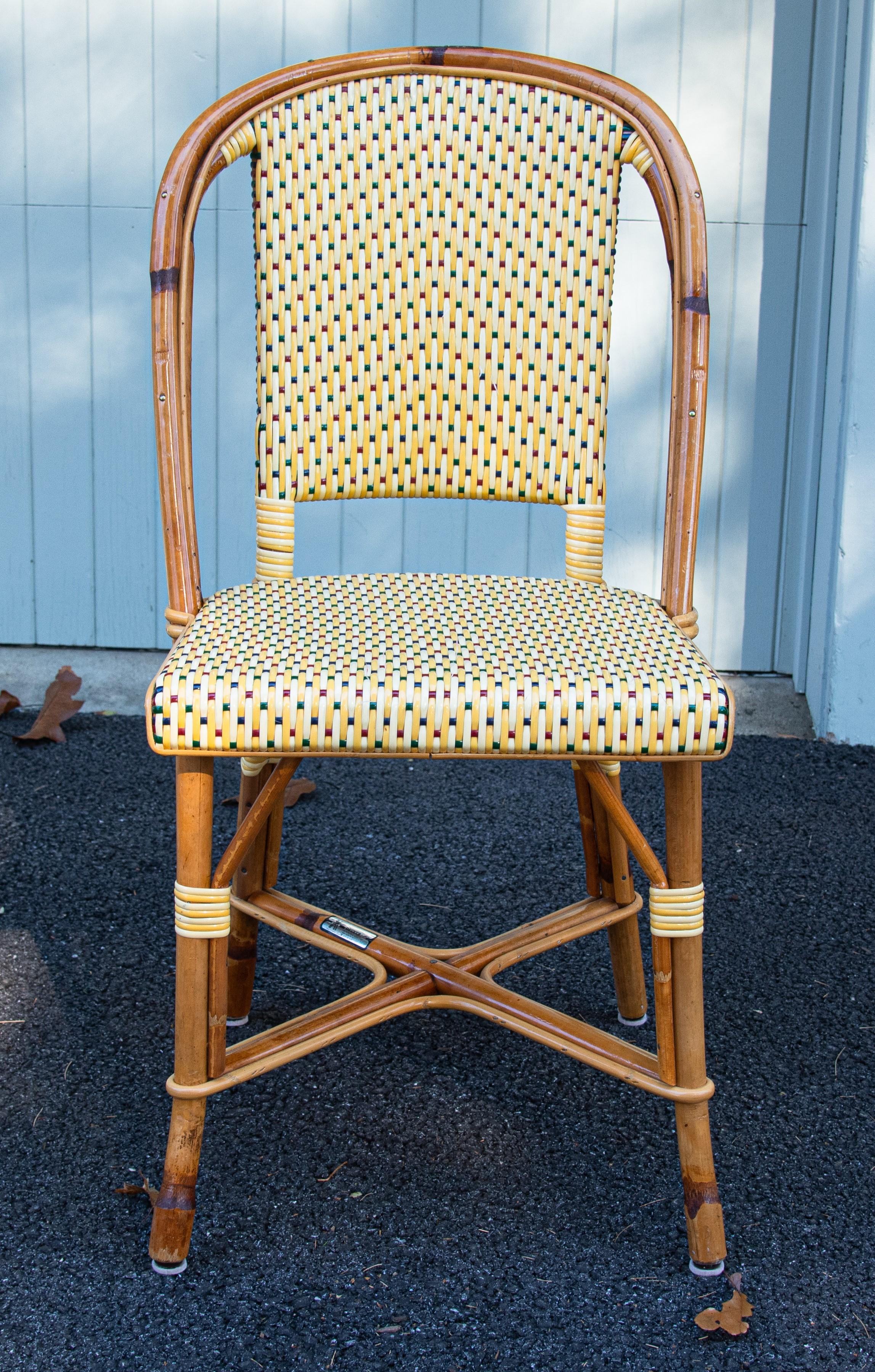 These are the classic Parisian bistro side chairs. Their rattan frame is crafted in a time-honored technique perfected by the French, bent and shaped by hand until the iconic shape is achieved and the rattan’s subtle variations enhance the beauty of