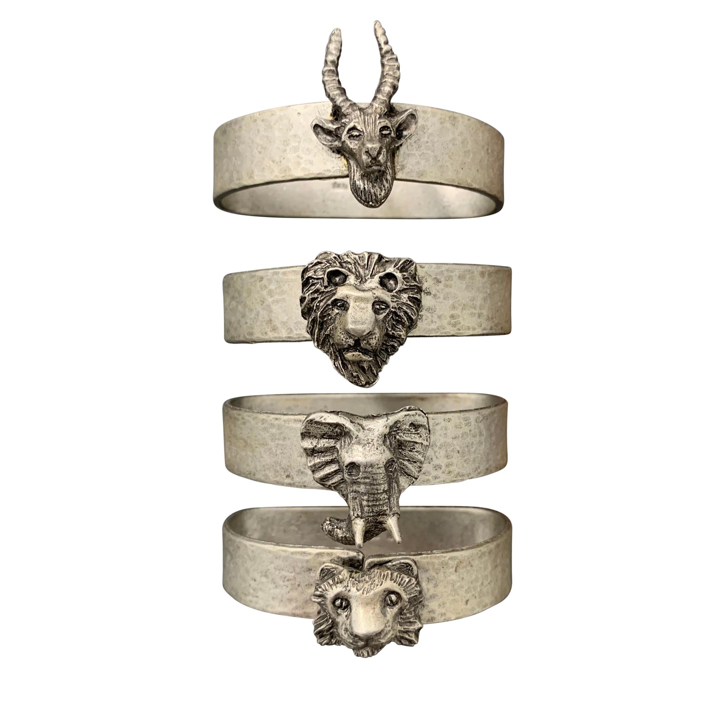 Set of Four Vintage Pewter Safari Themed Napkin Rings 1