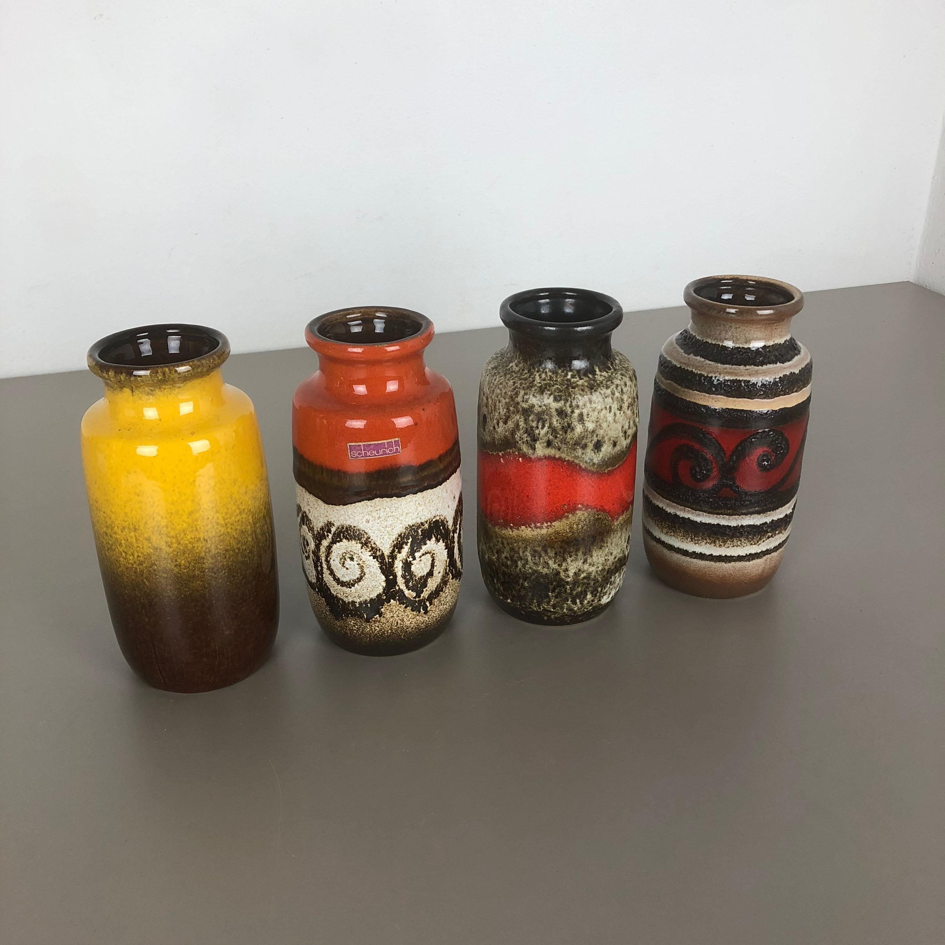 Article:

Set of four fat lava art vases

Producer:

Scheurich, Germany

Decade:

1970s

These original vintage vases was produced in the 1970s in Germany. It is made of ceramic pottery in fat lava optic. Super rare in this coloration.