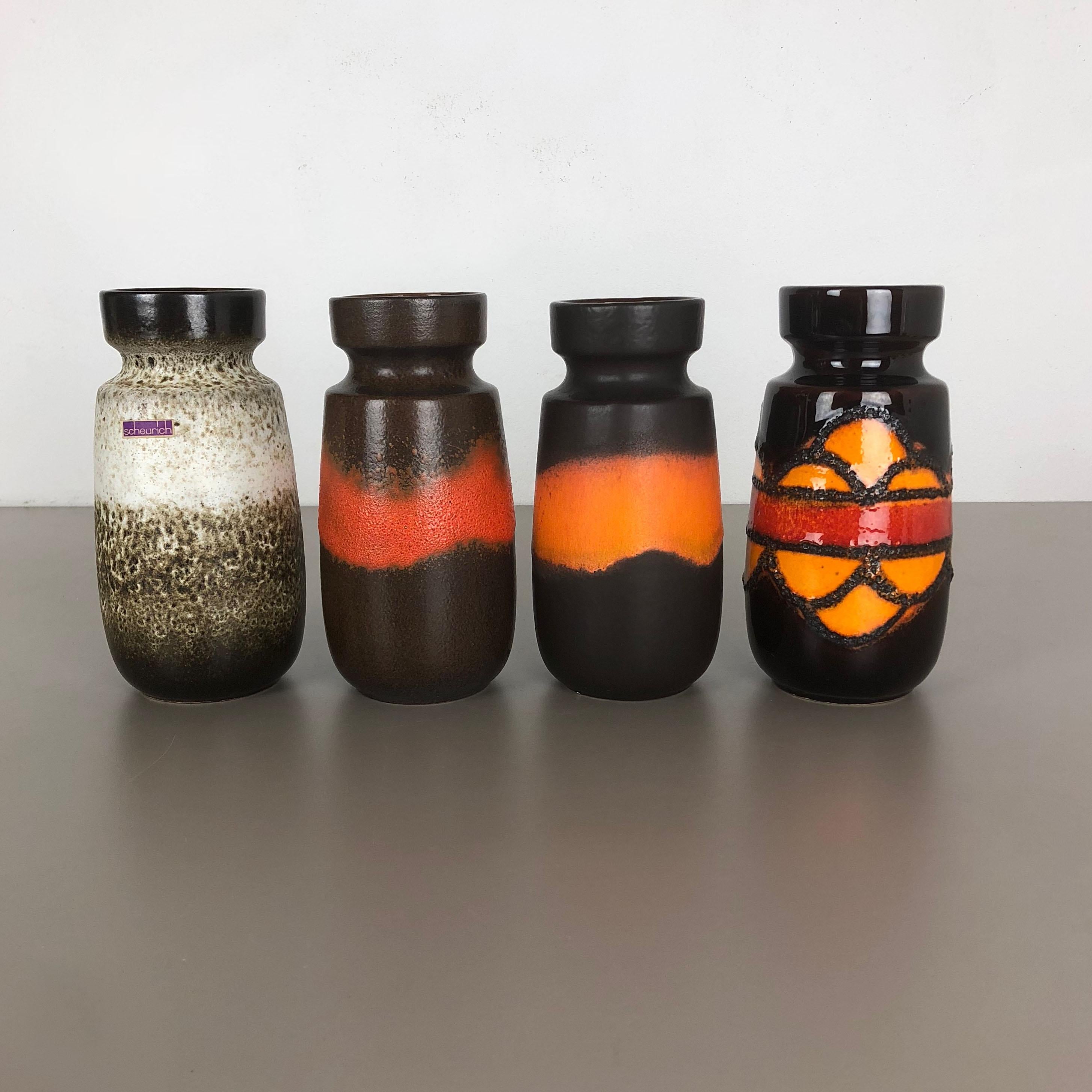 Article:

Set of four fat lava art vases

Producer:

Scheurich, Germany

Decade:

1970s

These original vintage vases was produced in the 1970s in Germany. It is made of ceramic pottery in fat lava optic. Super rare in this coloration.