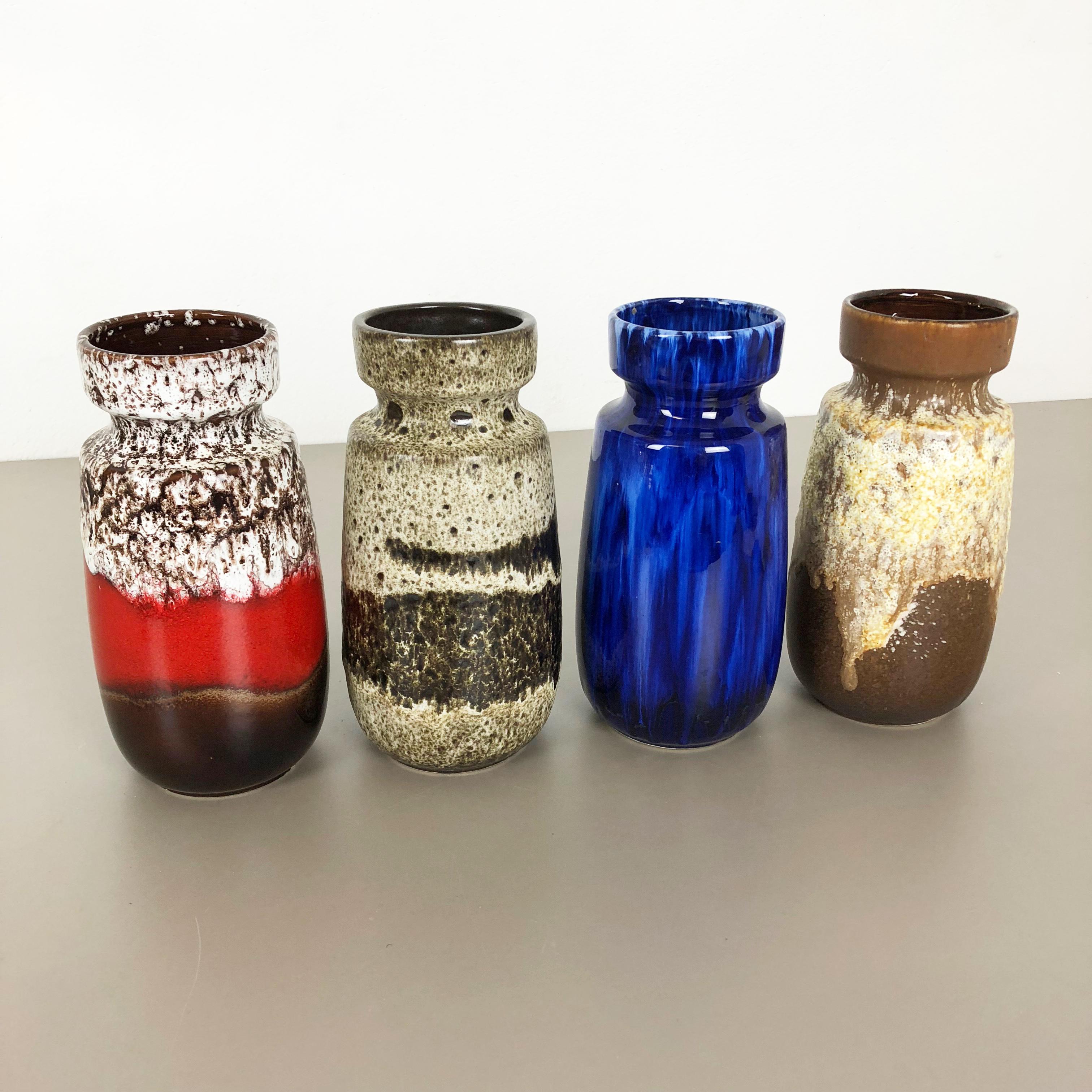 Article:

Set of four fat lava art vases

Producer:

Scheurich, Germany

Decade:

1970s

These original vintage vases was produced in the 1970s in Germany. It is made of ceramic pottery in fat lava optic. Super rare in this coloration.
