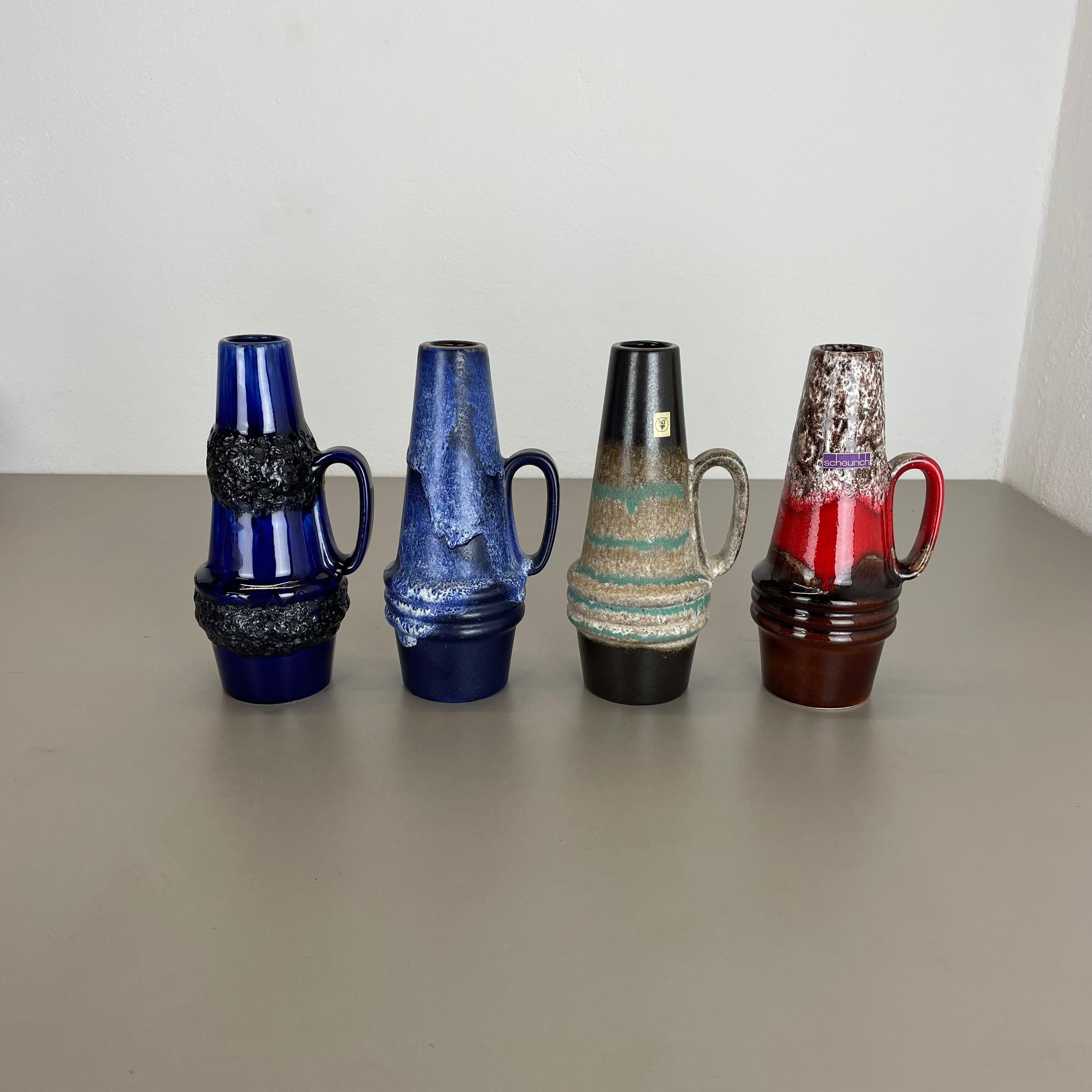 Article :

Ensemble de quatre vases d'art en lave grasse


Producteur :

Scheurich, Allemagne



Décennie :

1970s


Ces vases vintage originaux ont été produits dans les années 1970 en Allemagne. Il est réalisé en poterie céramique
