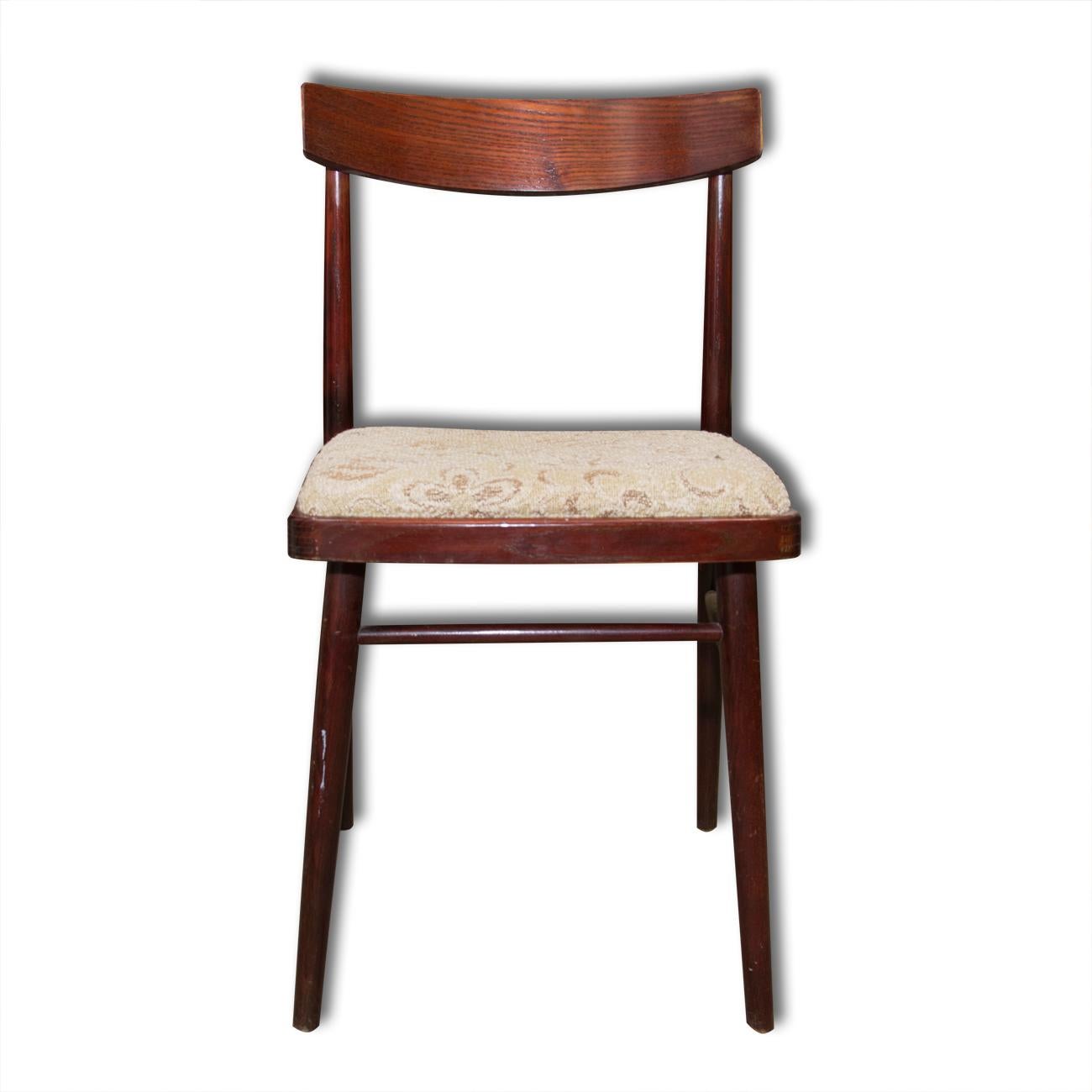 Vintage Czechoslovak upholstered dining chairs, set of four. Made in Czechoslovakia in the 1970s and produced by JITONA. In good vintage condition. Plywood corpus with polished beech mahogany wood. Traces of wear and tear commensurate with age, it