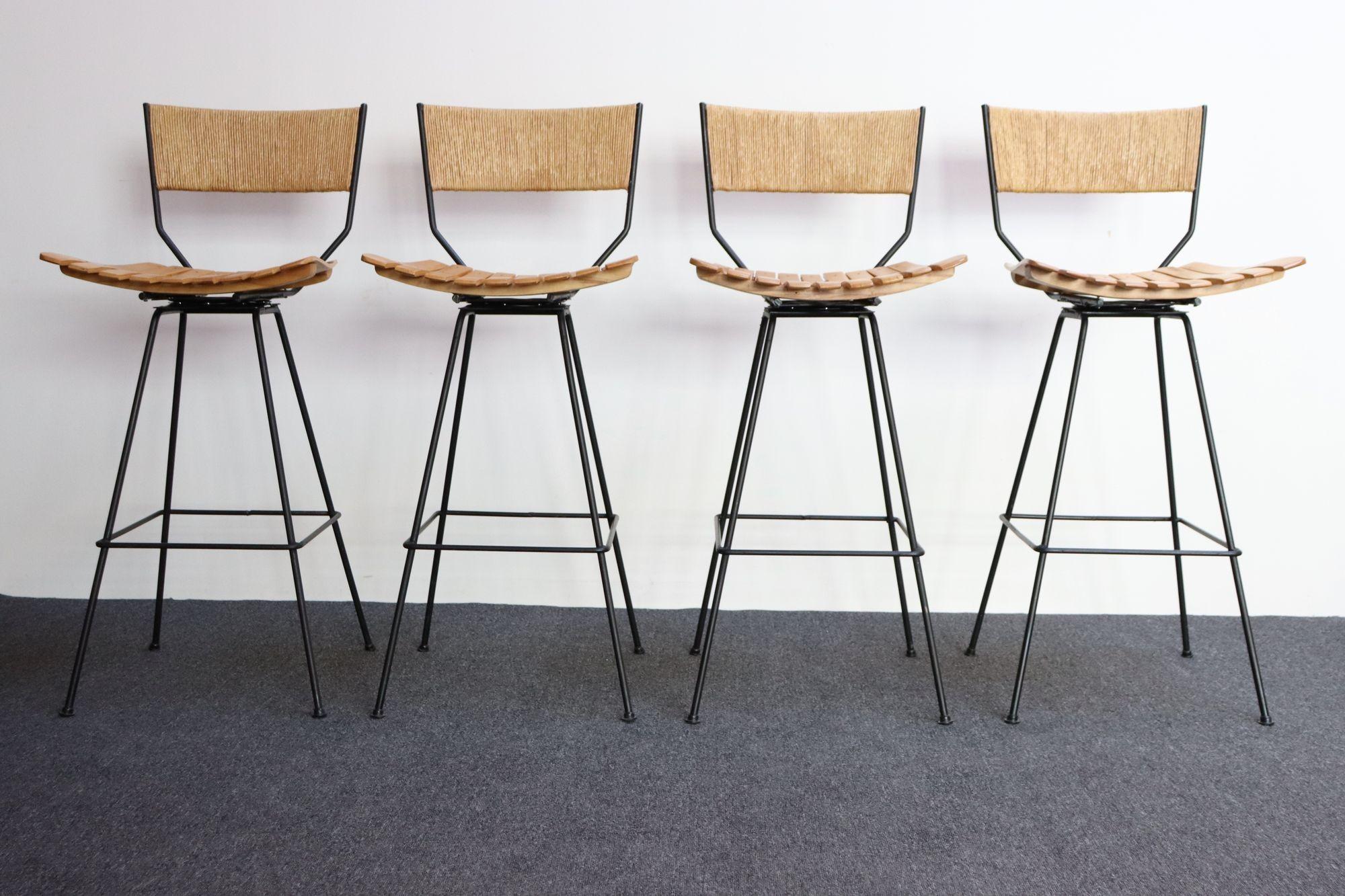 Mid-Century Modern Set of Four Vintage Rush and Iron Swiveling Bar Stools by Arthur Umanoff