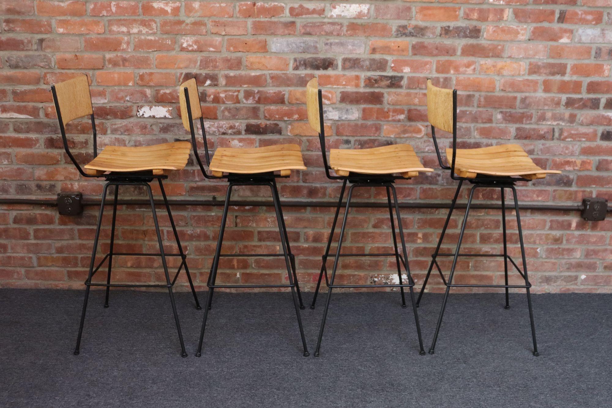 American Set of Four Vintage Rush and Iron Swiveling Bar Stools by Arthur Umanoff