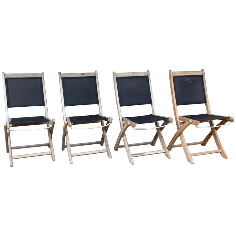 Set of Four Vintage Teak and Nylon Folding Outdoor Chairs Found in