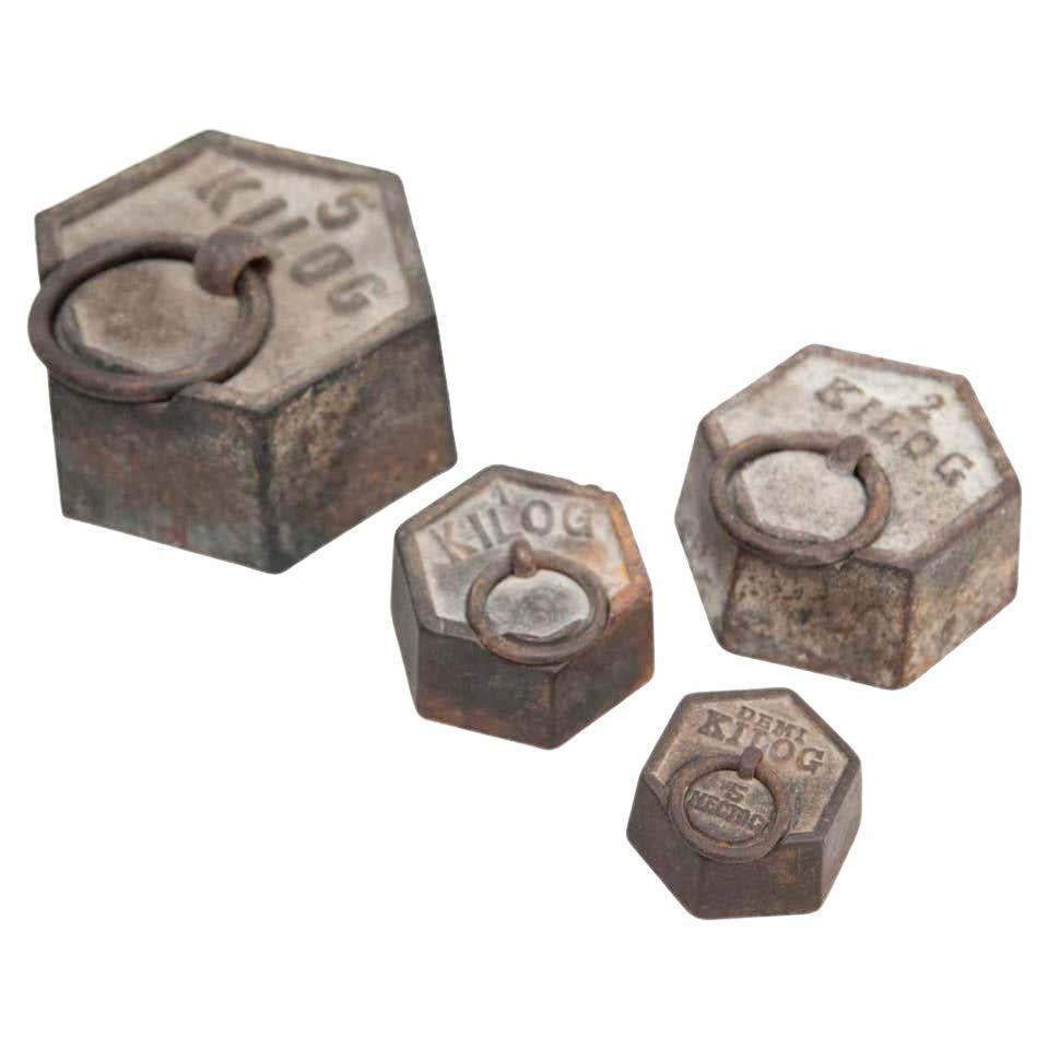 Set of Four Vintage Weights, circa 1920 For Sale