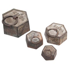 Set of Four Used Weights, circa 1920